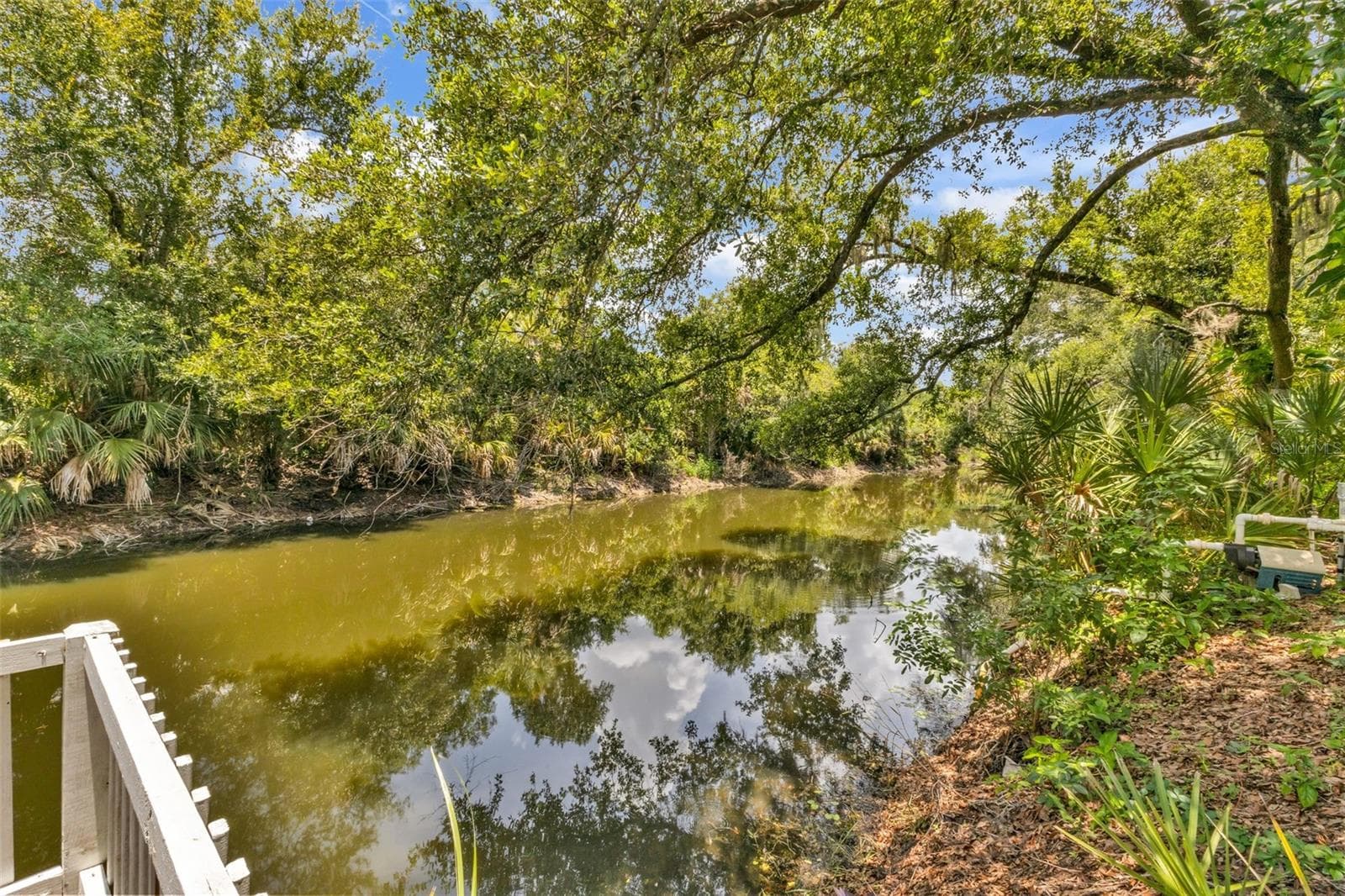 Do you value canal access, freshwater fishing, and a backyard that actually works for your lifestyle? This one combines all those features. - 297 FLAMINGO BLVD, PORT CHARLOTTE