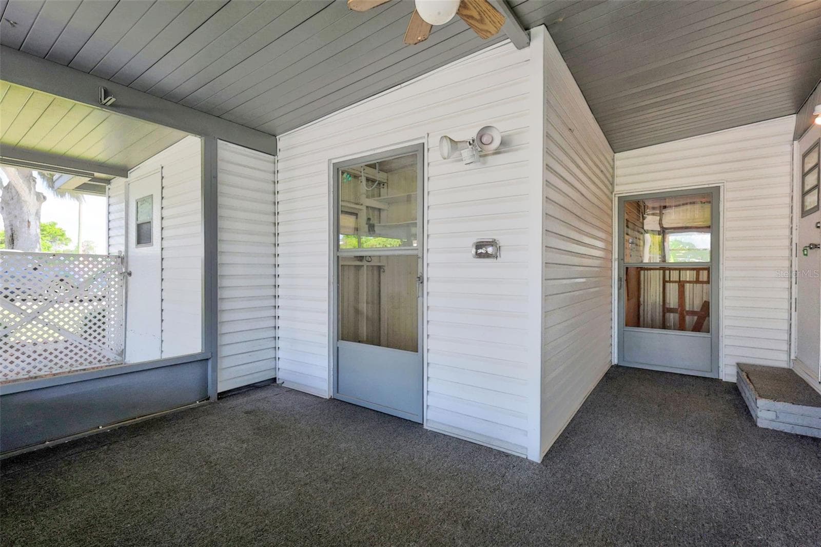Laundry room within screen porch - 34312 CARL RD, LEESBURG