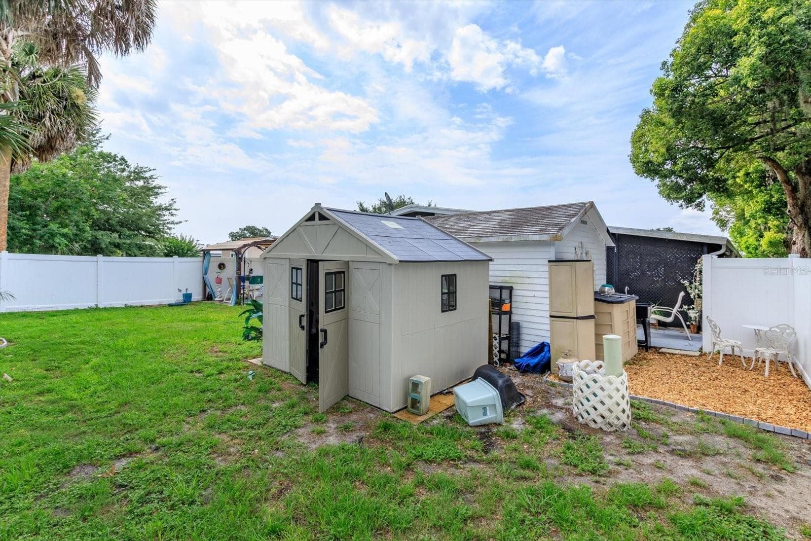Manufactured Home at 106 LEISURE WORLD DR N, DEBARY, photo 23 of 43