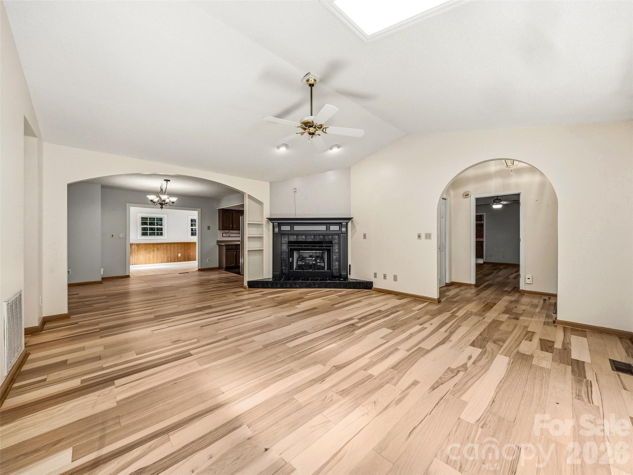 New hardwood throughout the main level. - 206 Camellia Way, Laurel Park