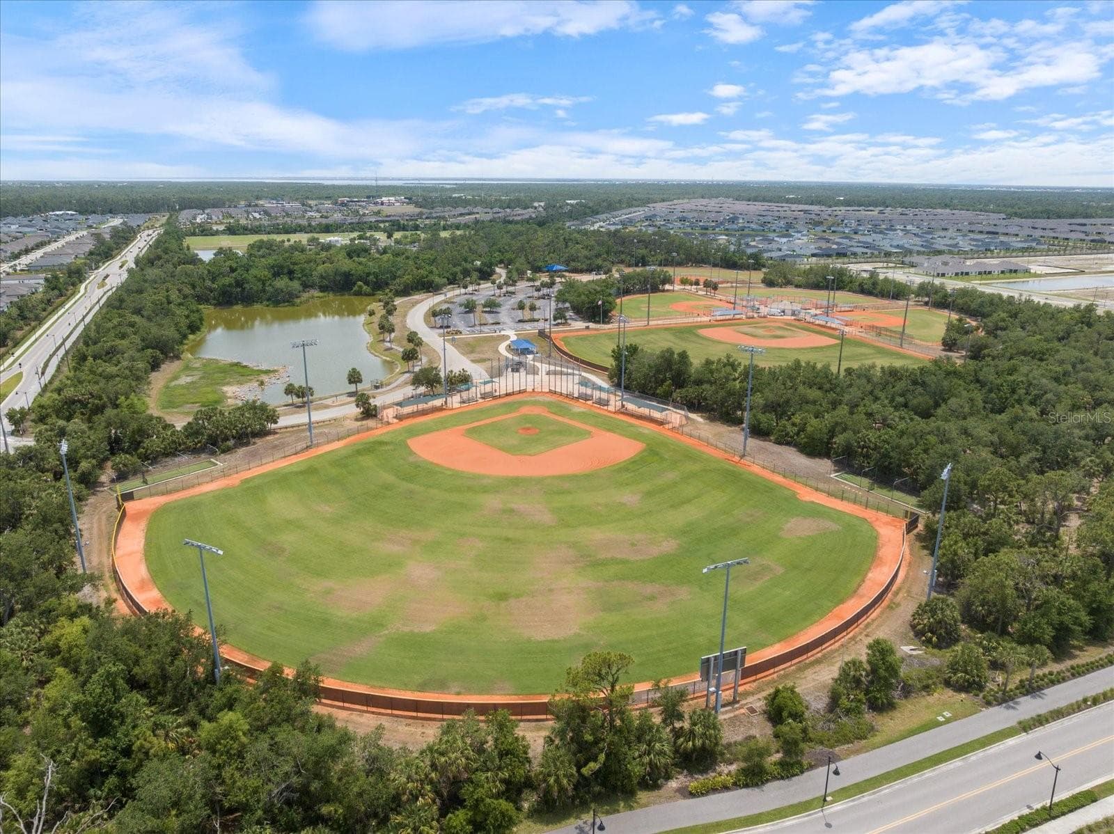100+ acres, multi-purpose fields, baseball, softball and soccer fields, disc golf, nature preserve, walking trail, restrooms, concession stand, and 4 indoor pickleball, basketball, etc - 297 FLAMINGO BLVD, PORT CHARLOTTE