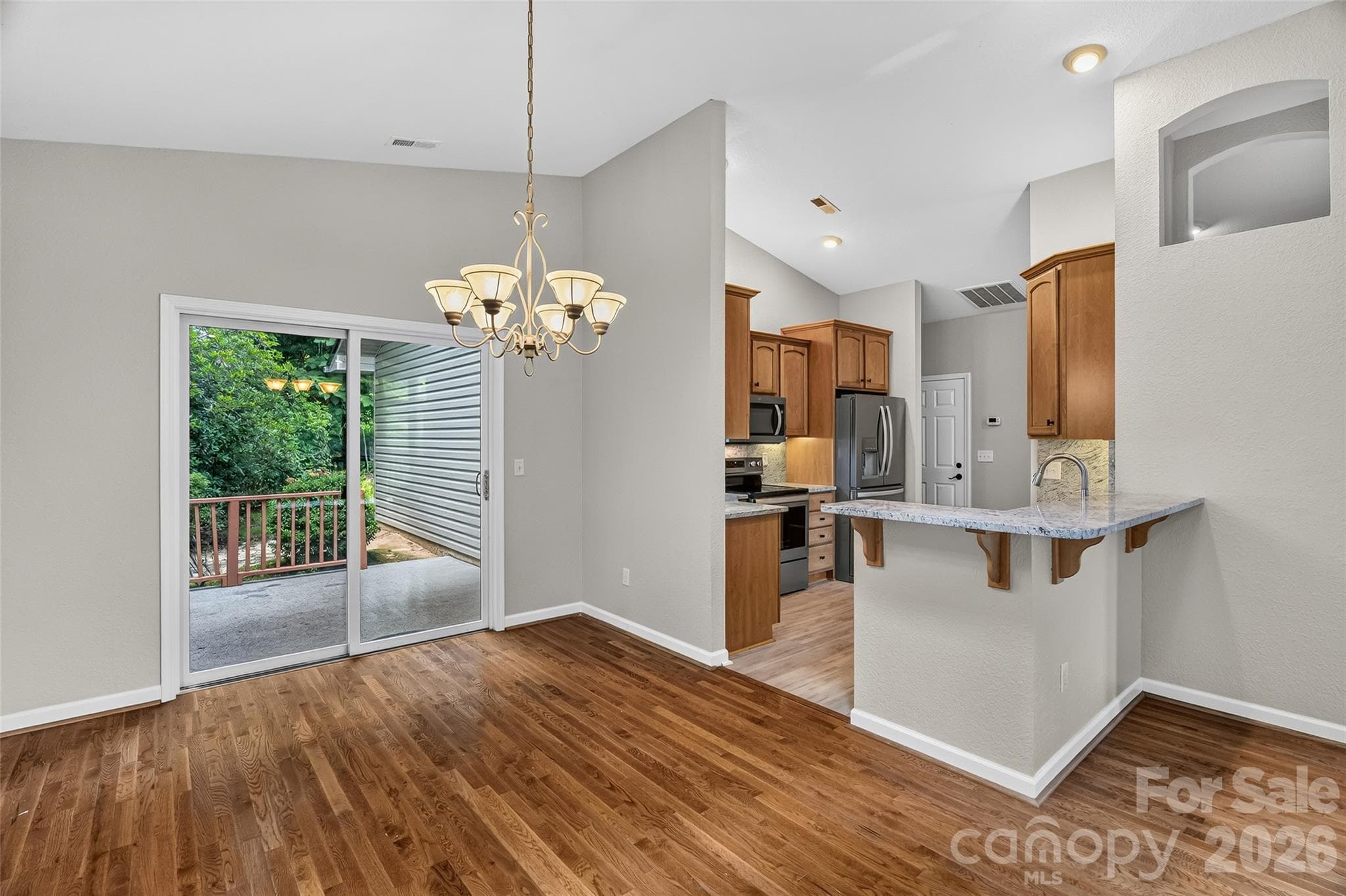 Dining area with private back porch - 51 Duya Court, Brevard