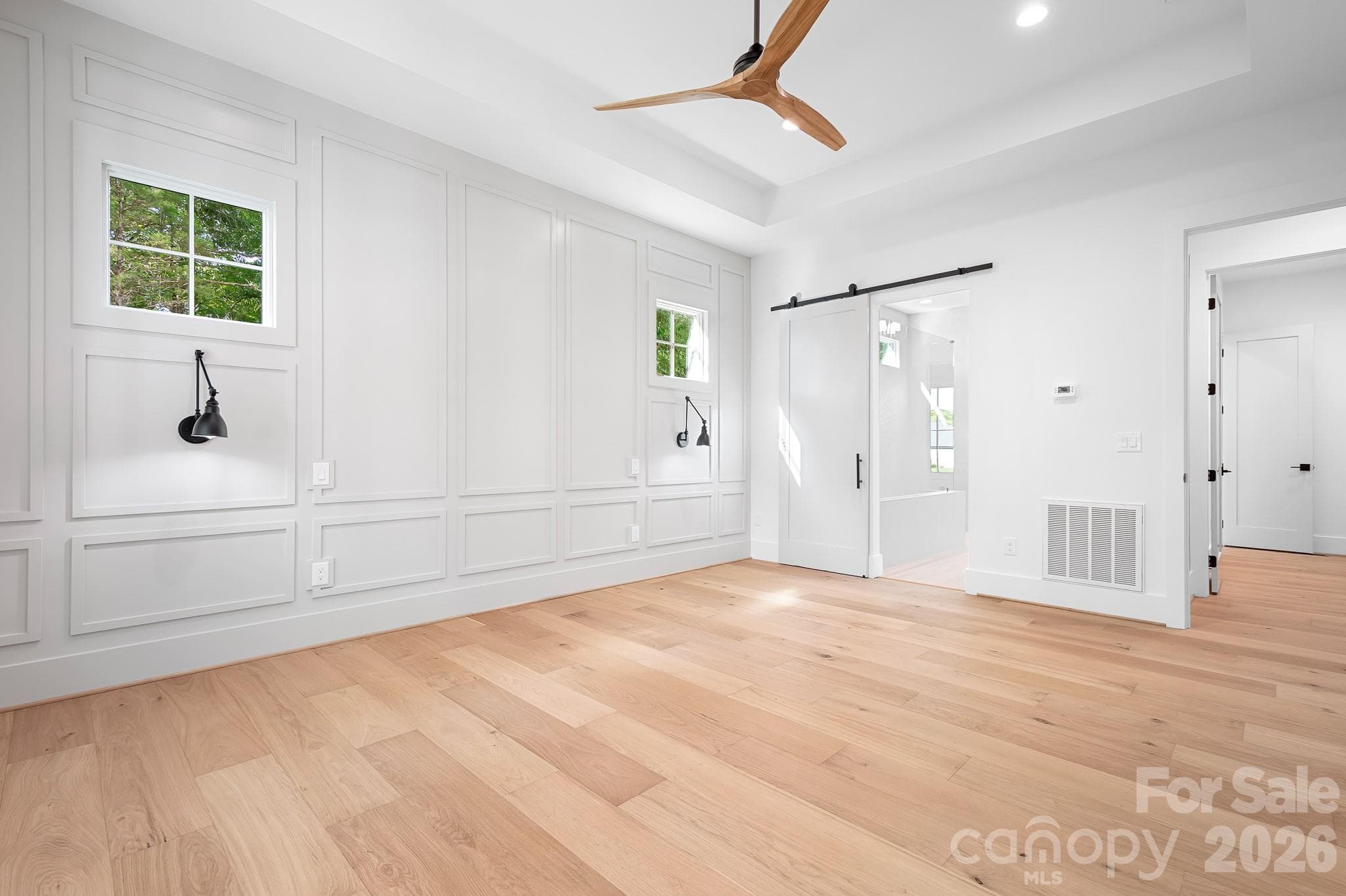 Sliding barn door to Primary ensuite bath - Mooresville