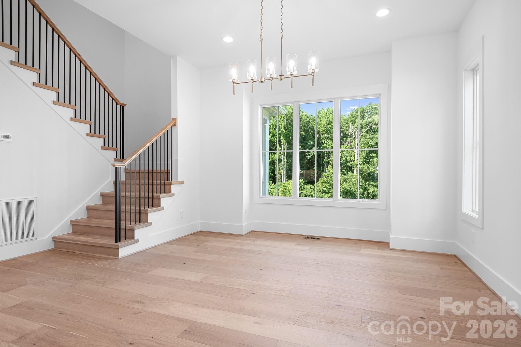 Beautiful stairway and view of park and open lot across the street - Mooresville