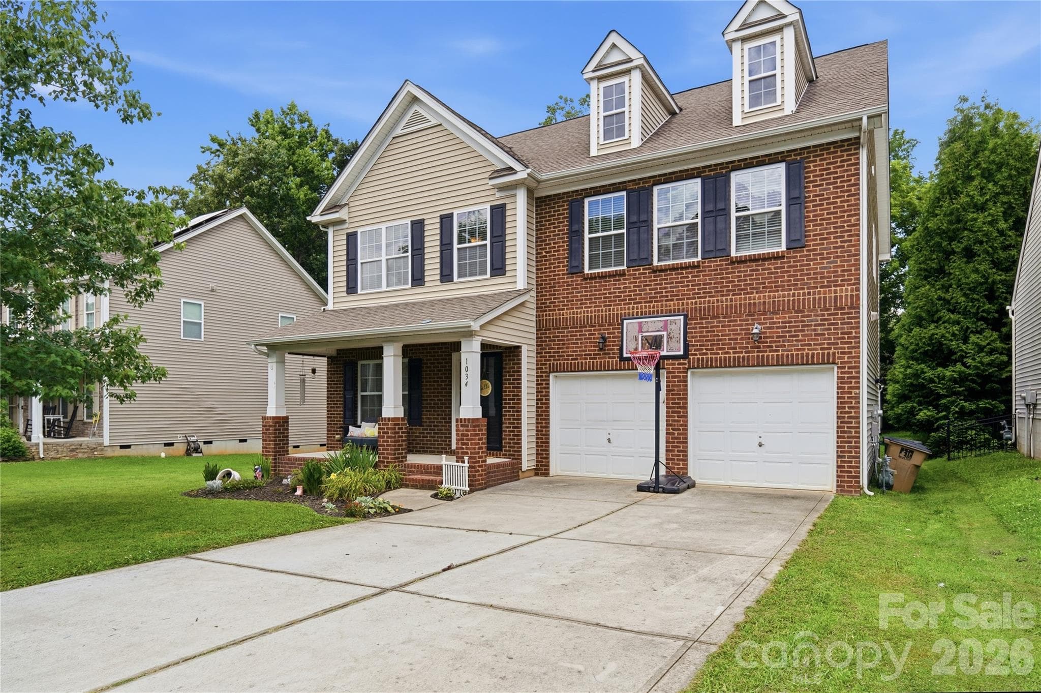 Handsome two-story brick-front home in the sought-after Brandon Oaks community - Indian Trail
