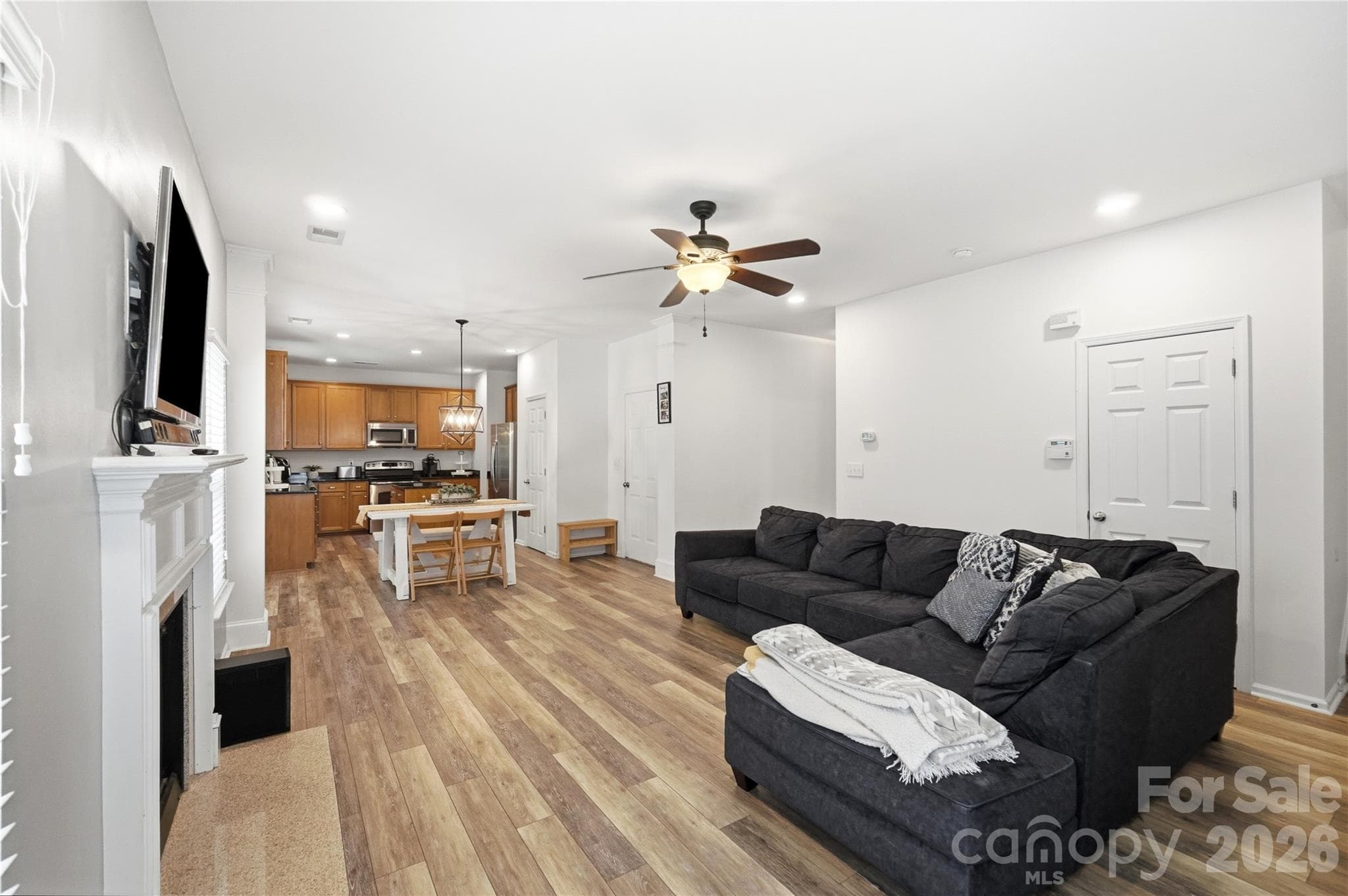 Open great room and kitchen designed for gathering and entertaining - Indian Trail