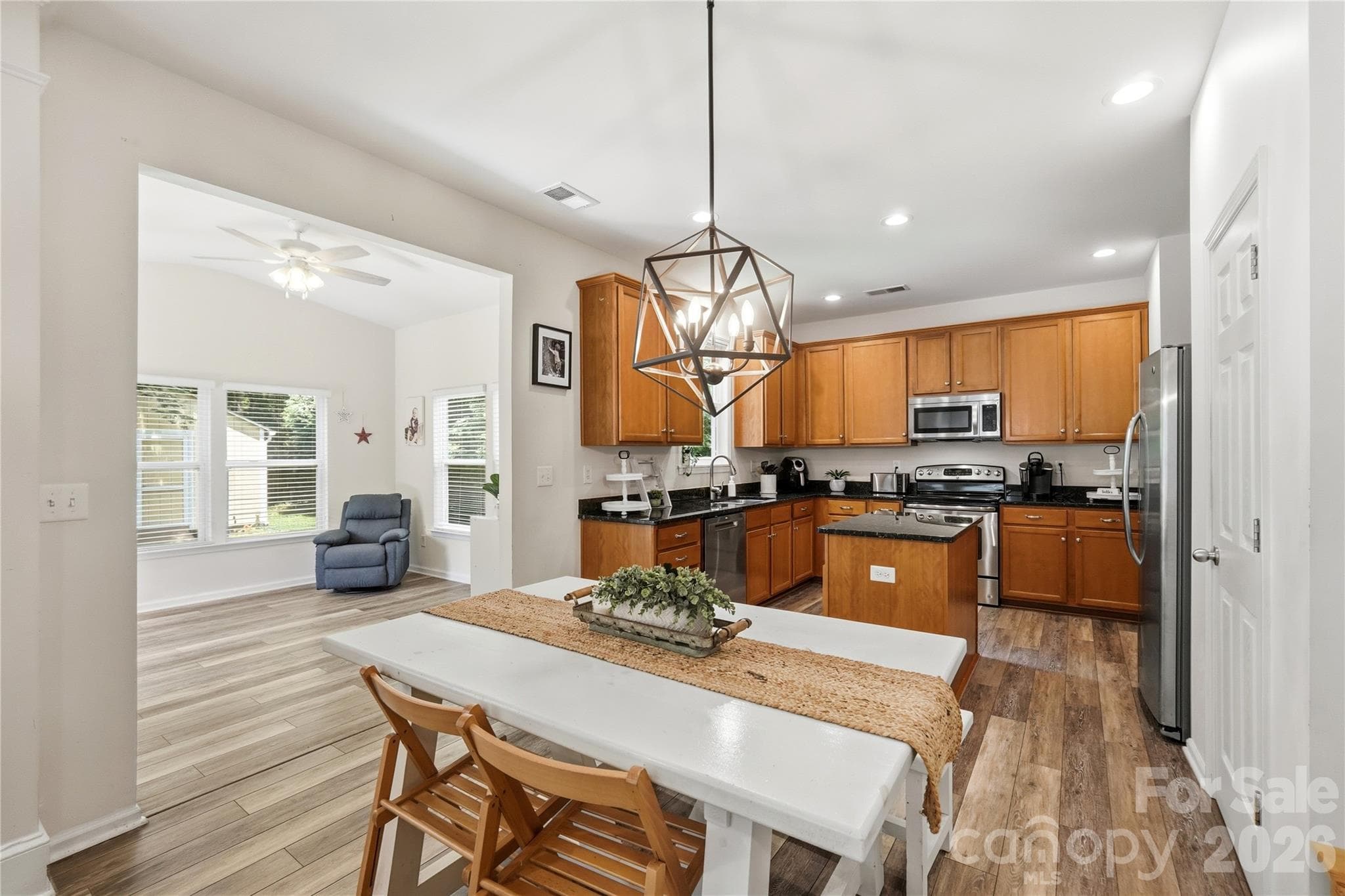 Spacious kitchen with a center island and pendant lighting - Indian Trail