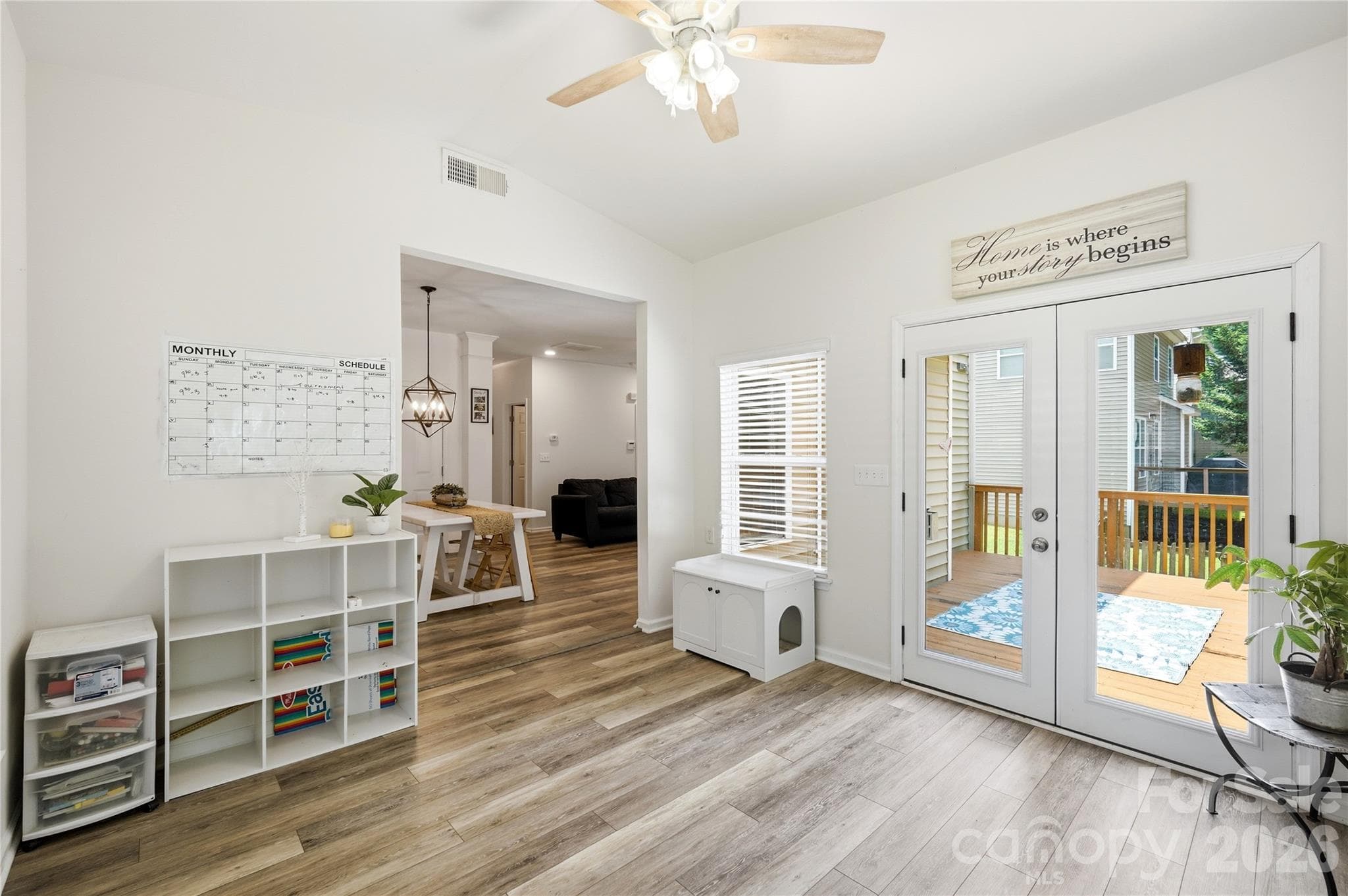 Sun-drenched sunroom wrapped in windows, made for relaxing year-round - Indian Trail