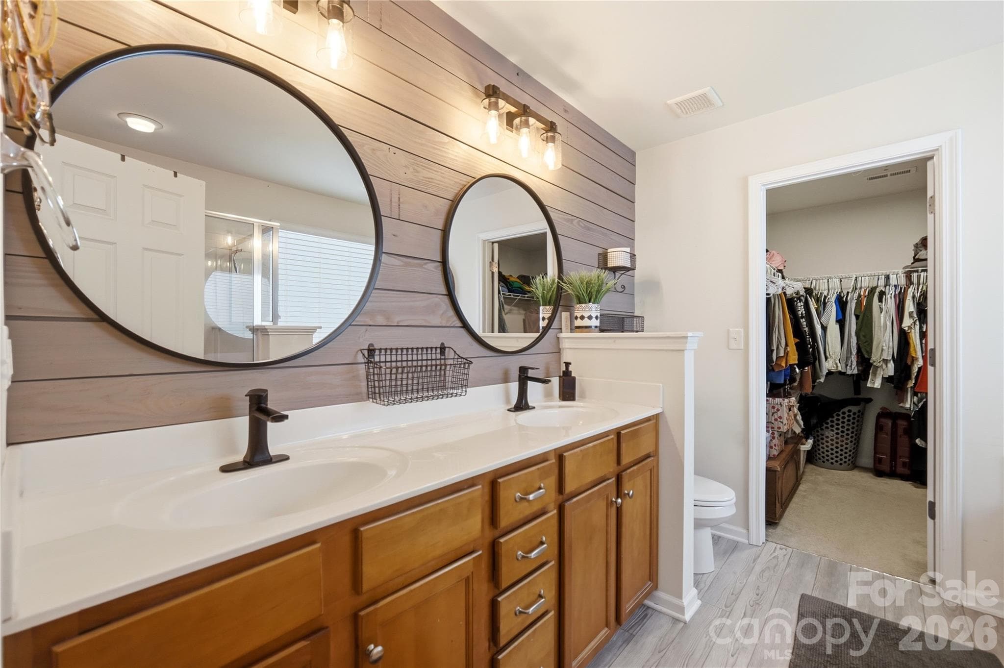 Spa-style primary bath with dual vanities - Indian Trail
