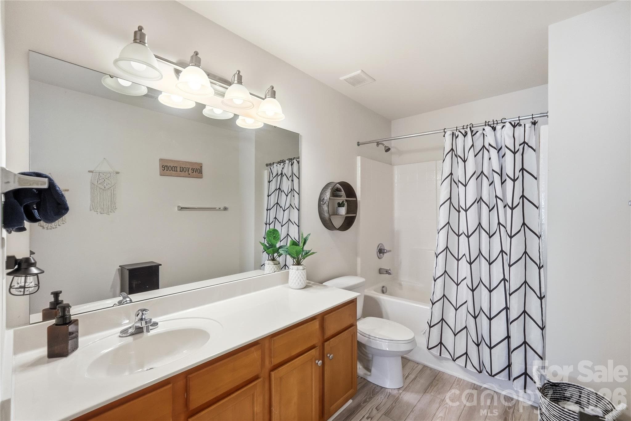 Full bath with a vanity and tub-shower combo - Indian Trail
