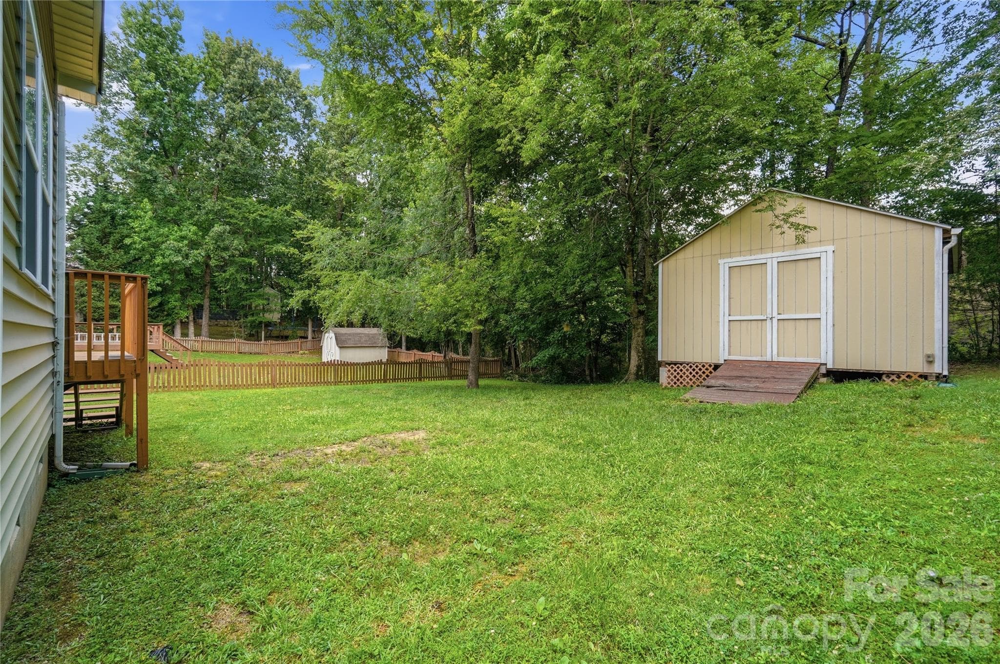 Level backyard with a handy storage shed for all your extras - Indian Trail