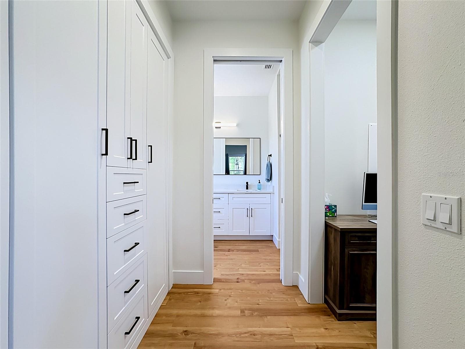 Through to the ensuite on bedroom 4 on the 2nd floor - 6925 BOCHI CIR, SARASOTA