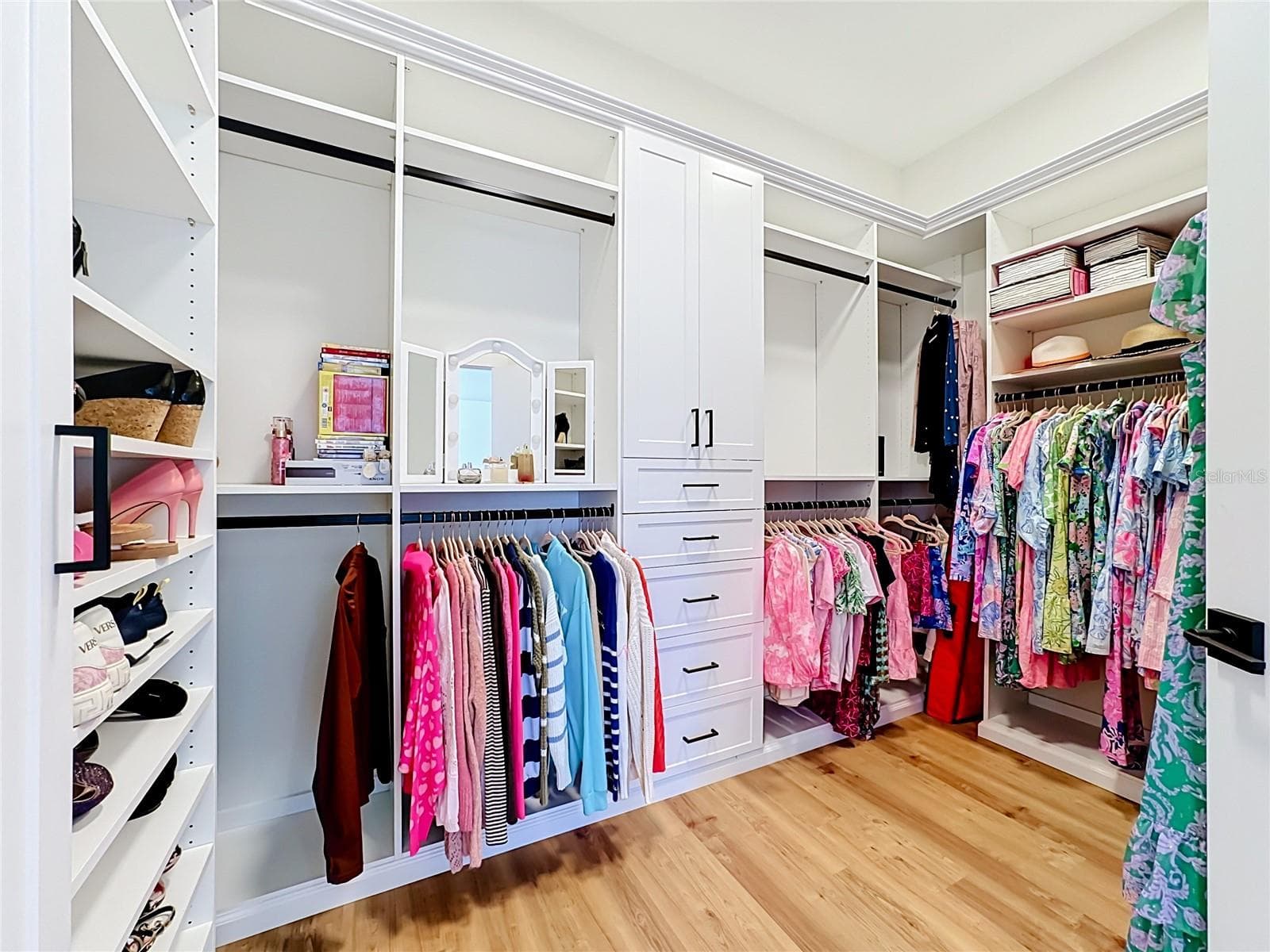 1 of 2 walk in closets in the primary suite - 6925 BOCHI CIR, SARASOTA