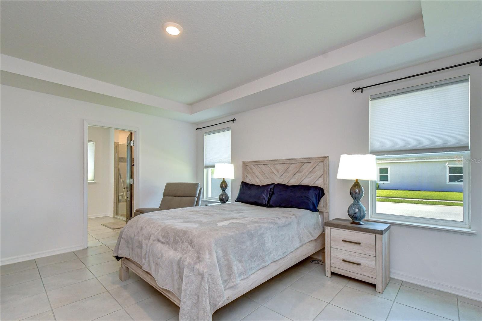 Relax and unwind in your Owner's Suite with sitting area. - 8325 OLIVE BROOK DR, WESLEY CHAPEL