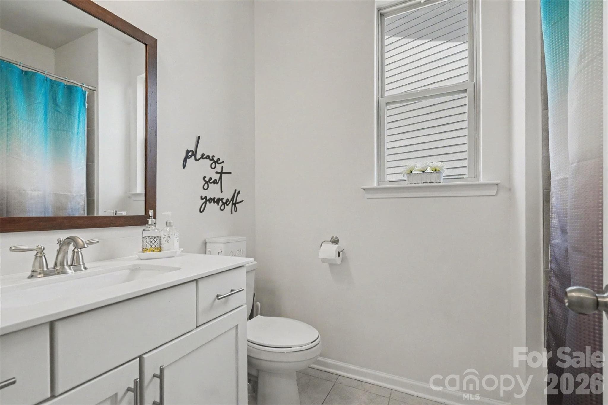 Full bath downstairs has solid counters and a bath/shower combination. - 2055 Yearden Lane, Monroe