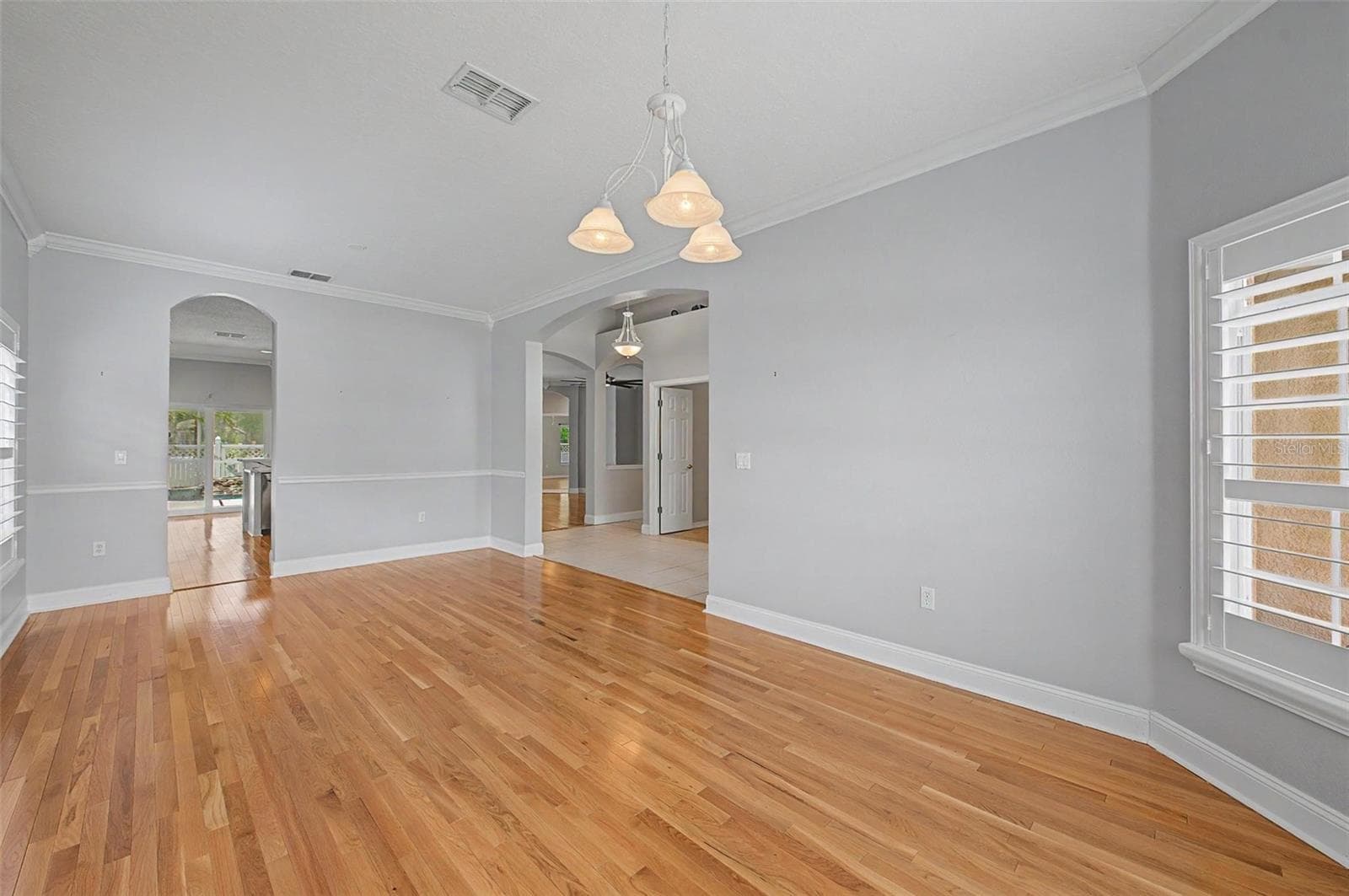 living room/dining room - 2811 RAVENDALE LN, HOLIDAY
