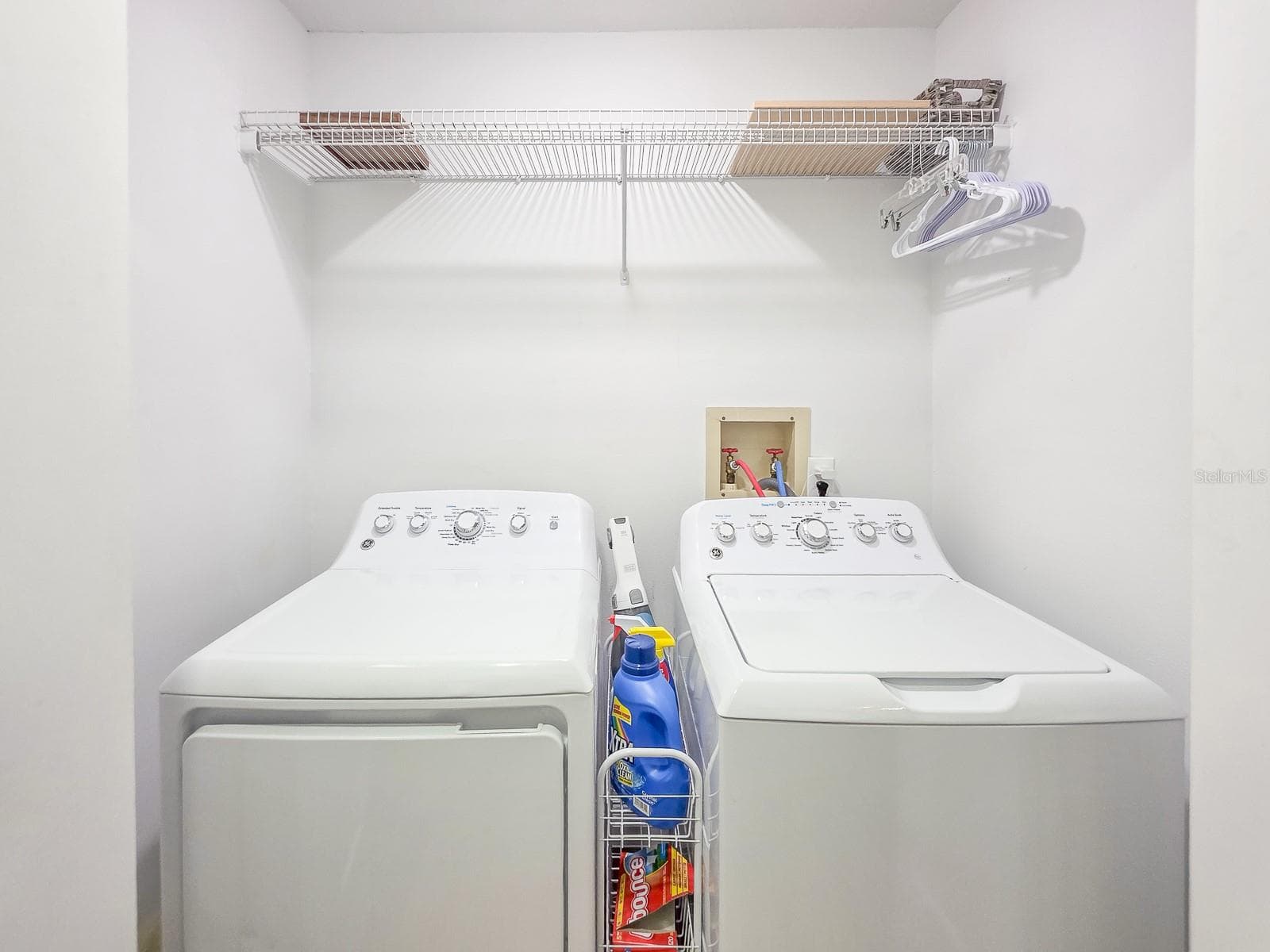 Hallway laundry closet. - 100 SEA PINES CIR, DAYTONA BEACH