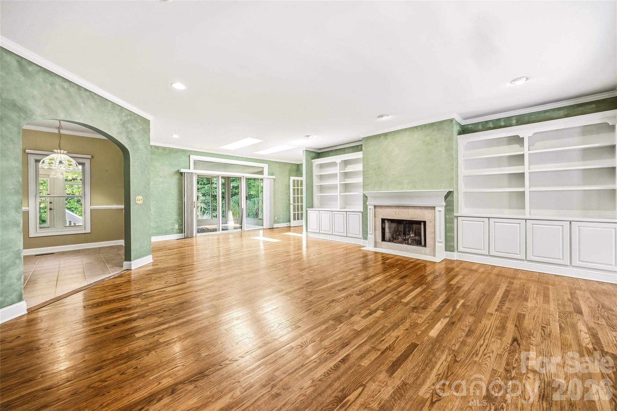 Great Room with Fireplace & Custom Built-Ins - 200 Teaberry Lane, Hendersonville
