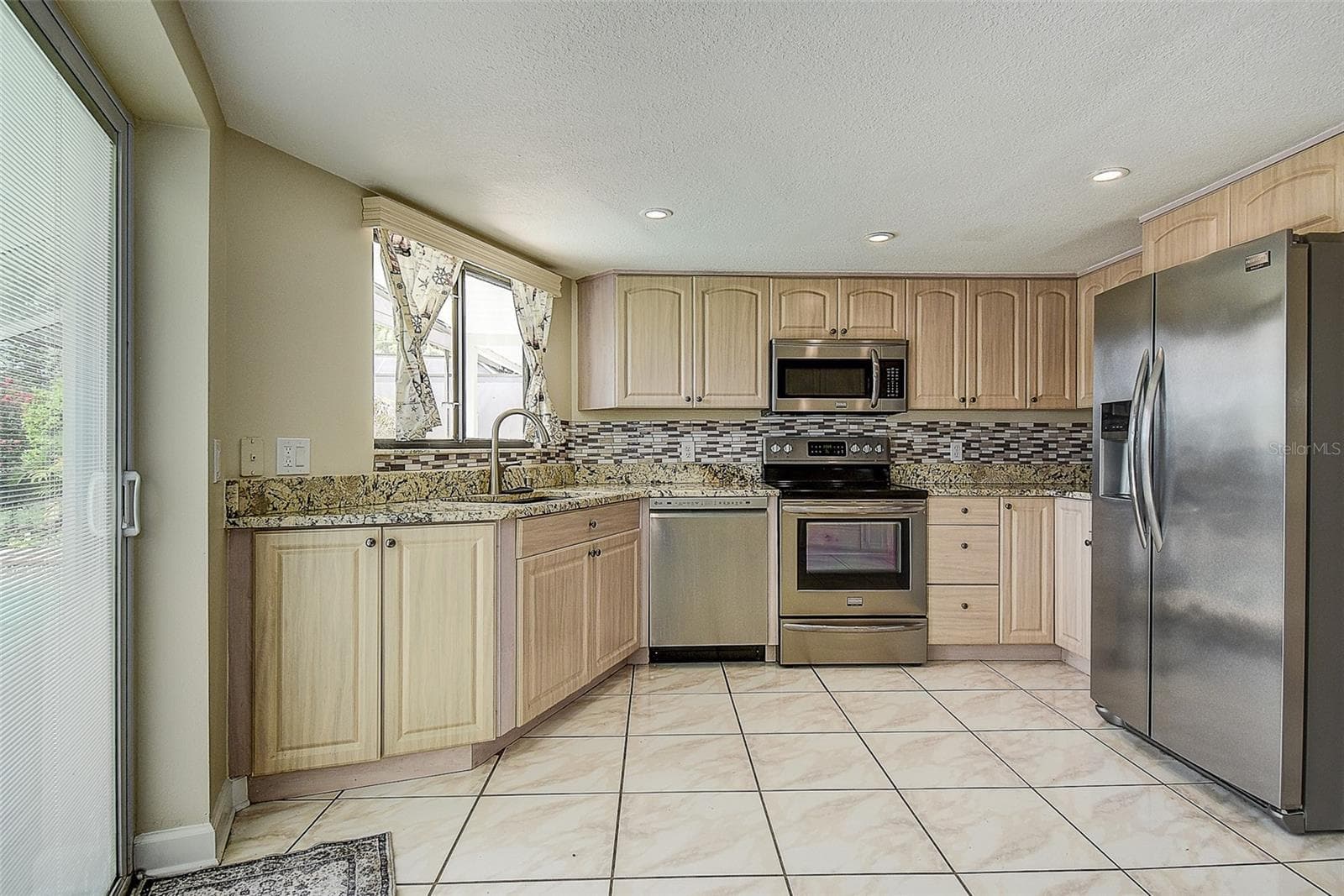 Single Family Residence at 2876 LAKE VALENCIA BLVD E, PALM HARBOR, photo 9 of 51