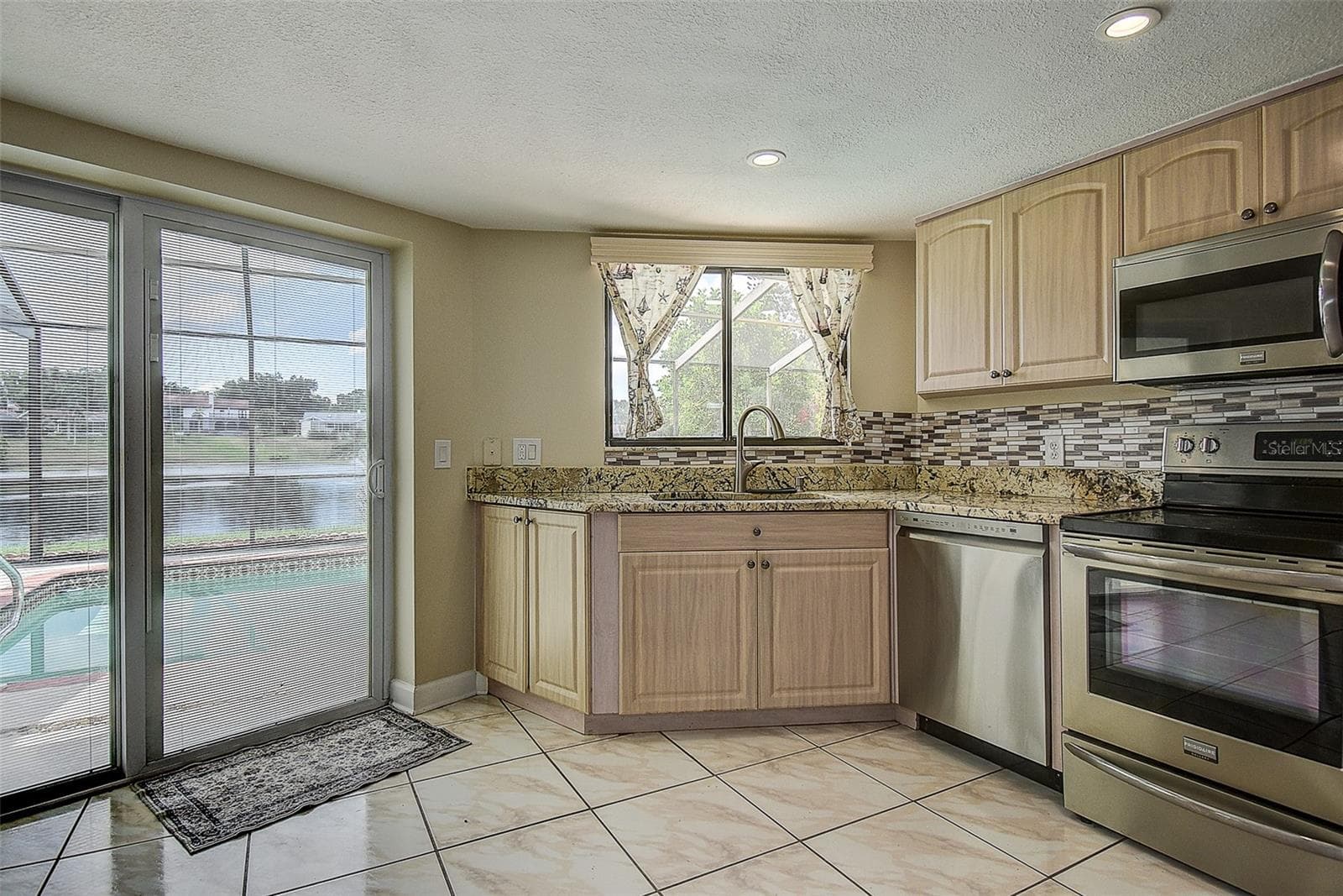 Single Family Residence at 2876 LAKE VALENCIA BLVD E, PALM HARBOR, photo 10 of 51