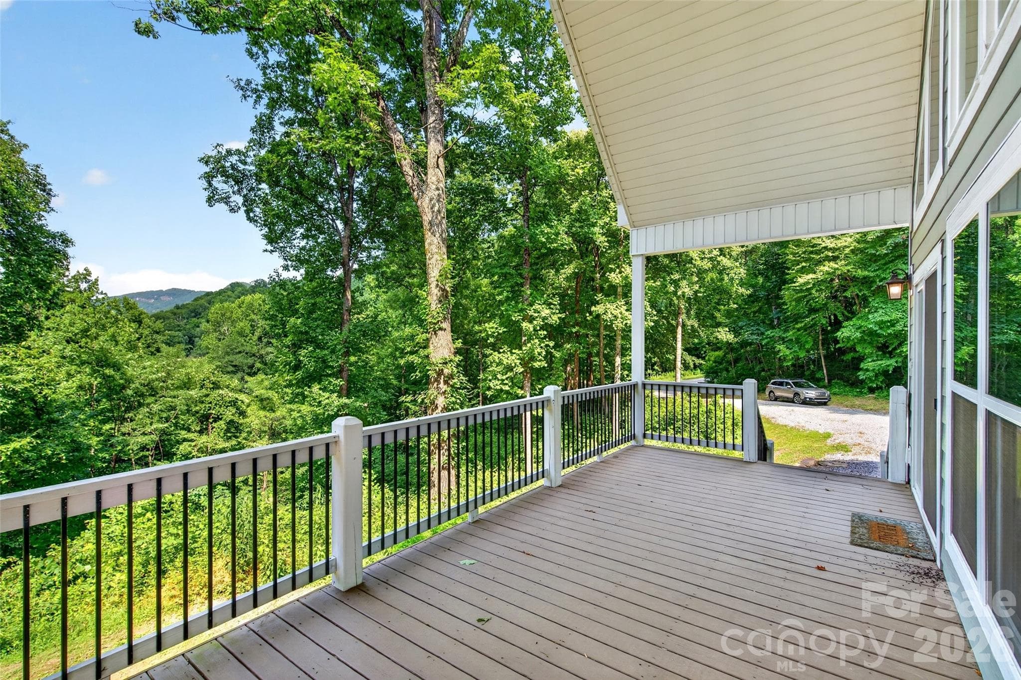 Four seasons will bring you four views from this porch. - 771 Sally Gap Road, Old Fort
