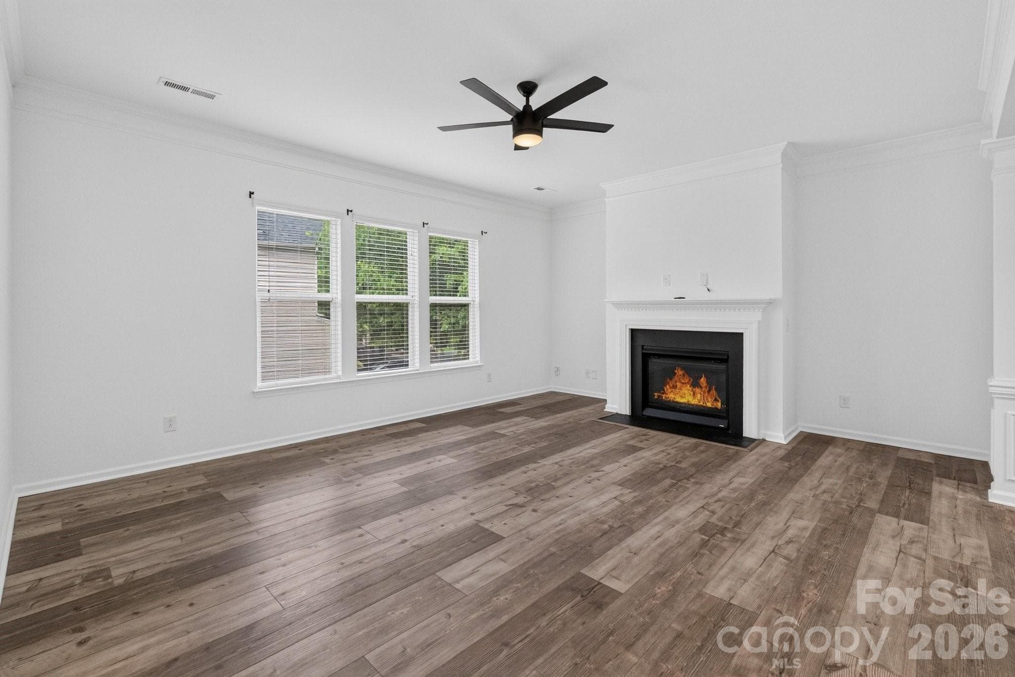 The family room has a gas fireplace to enjoy on those cool winter evenings. - Charlotte