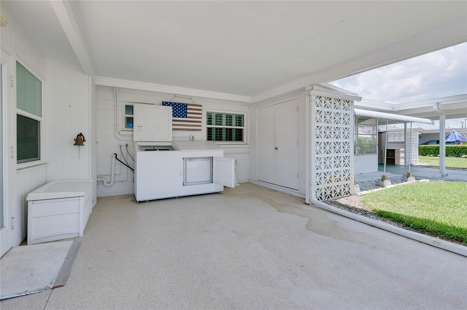 Washer & dryer located in carport - 112 THE CORSO #112, VENICE