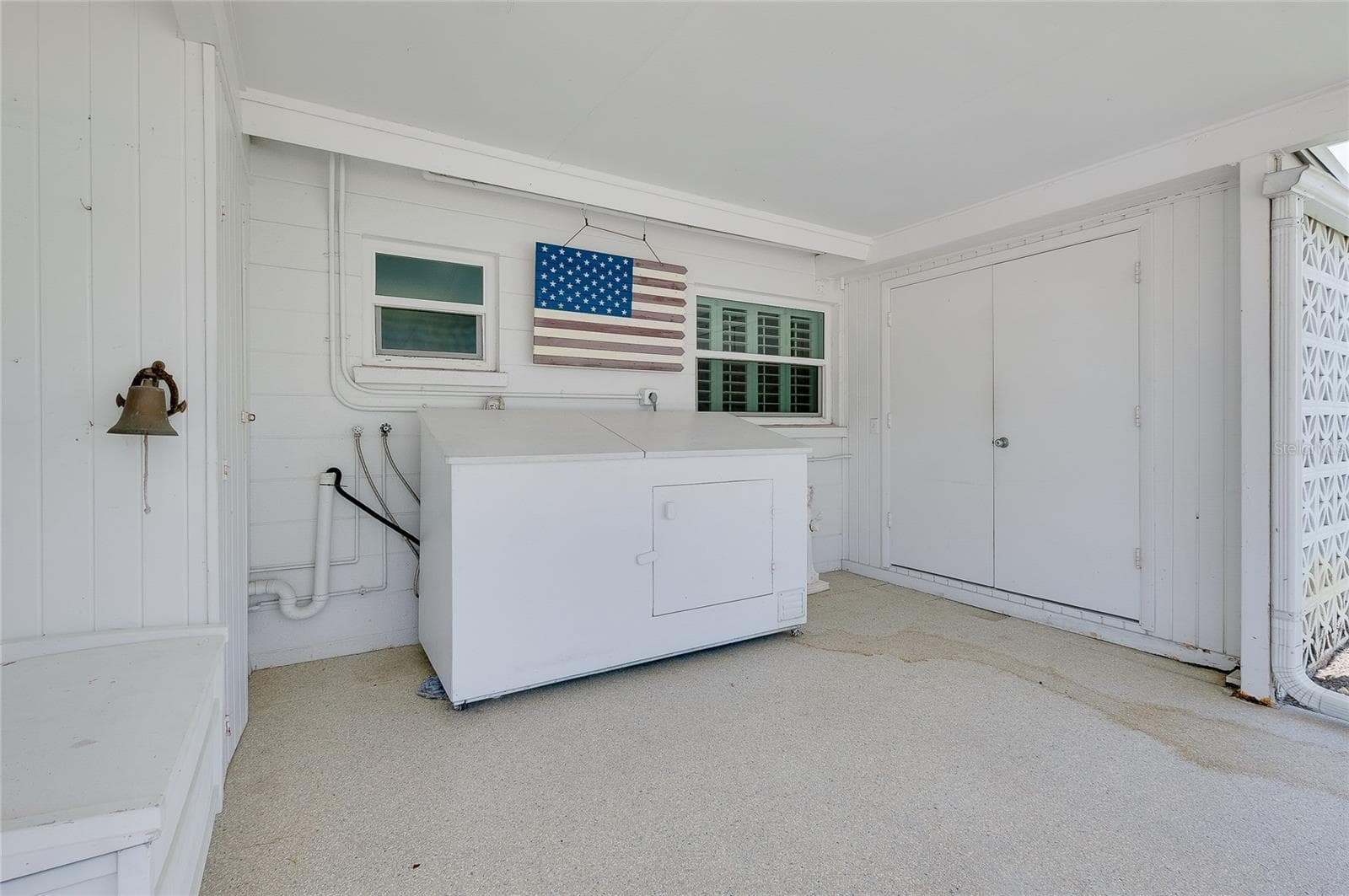 The laundry cabinetry is on wheels and can also be pulled out. - 112 THE CORSO #112, VENICE