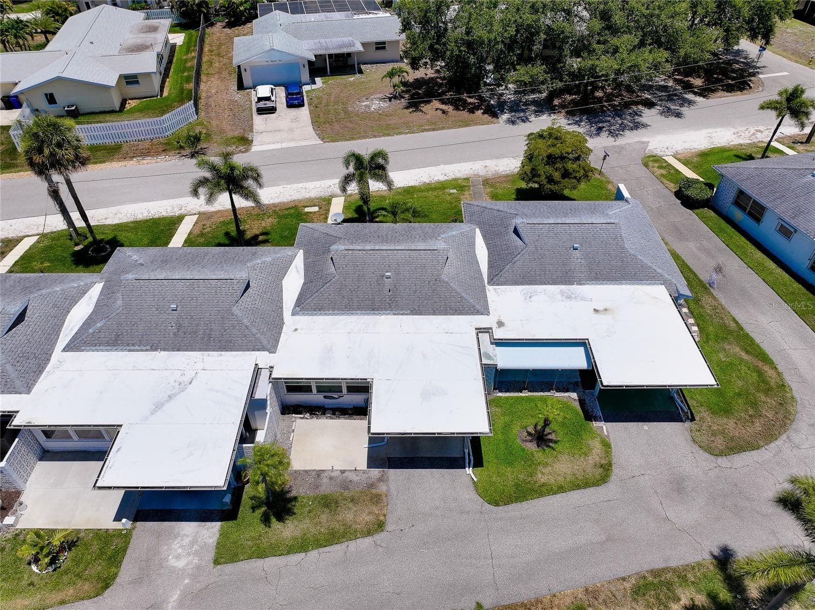 Aerial view of rear of the unit showing carport area. - 112 THE CORSO #112, VENICE