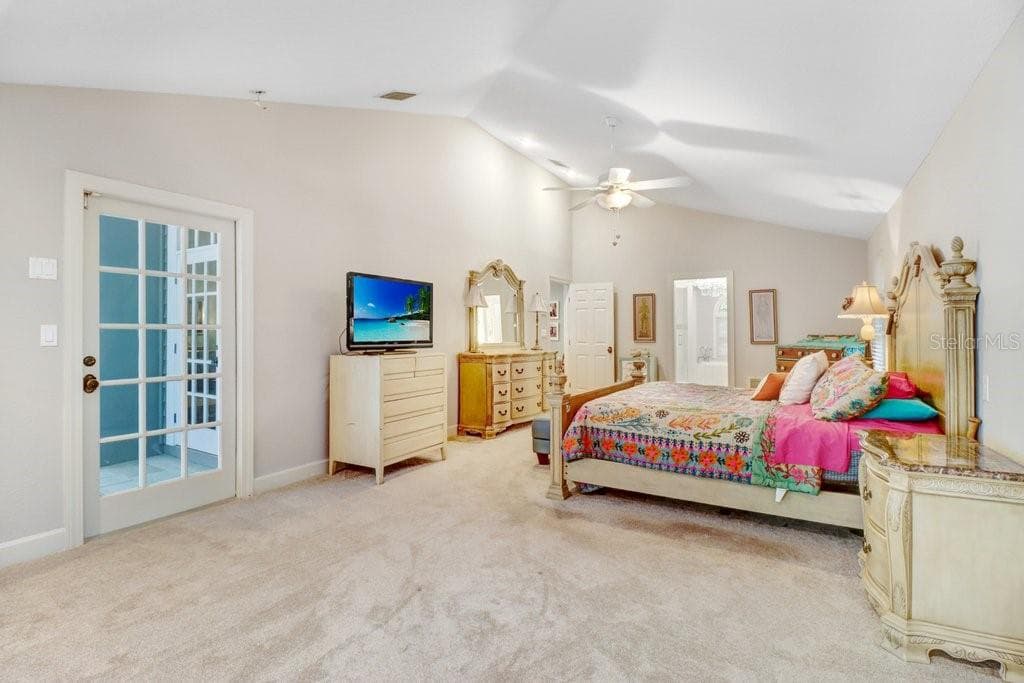 Master Bedroom highlighting vaulted ceilings. - 1976 DUNLOE CIR, DUNEDIN