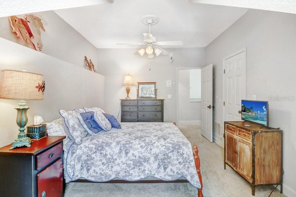 Another view of guest room with decorative ledge. - 1976 DUNLOE CIR, DUNEDIN
