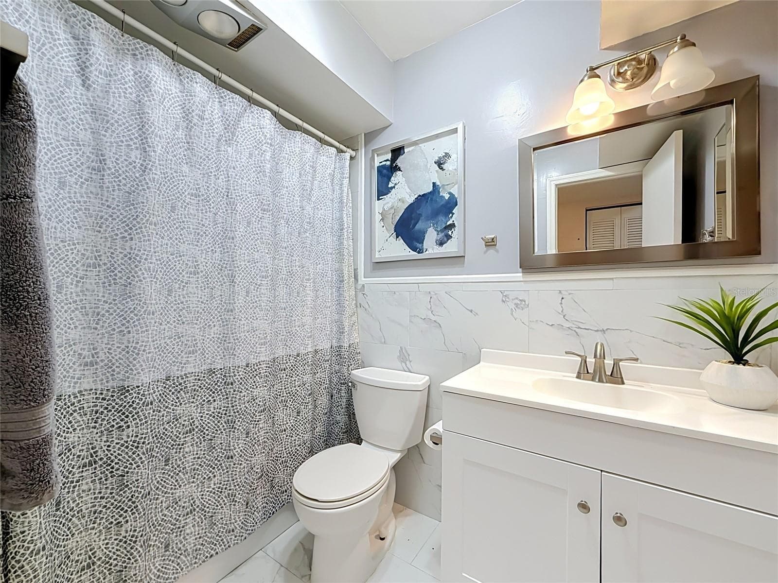 Guest Bath with Tub/Shower - 1900 68TH ST N #301, ST PETERSBURG