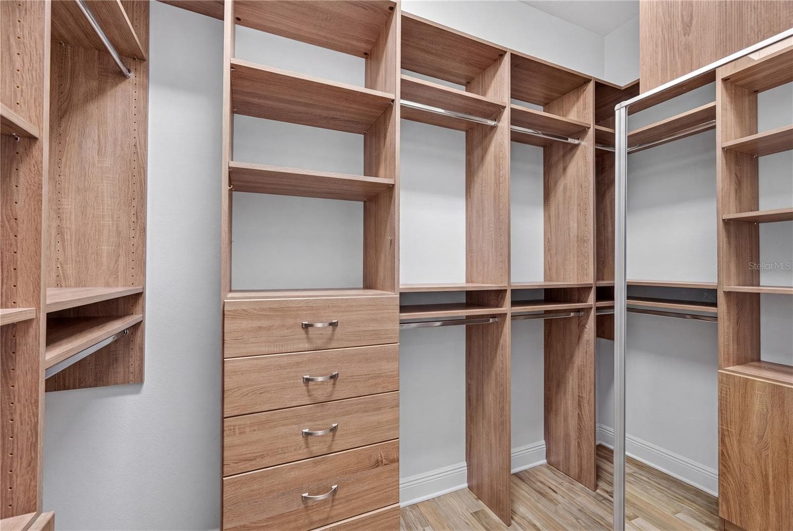 Hers closet - 8276 LARKSPUR CIR, SARASOTA