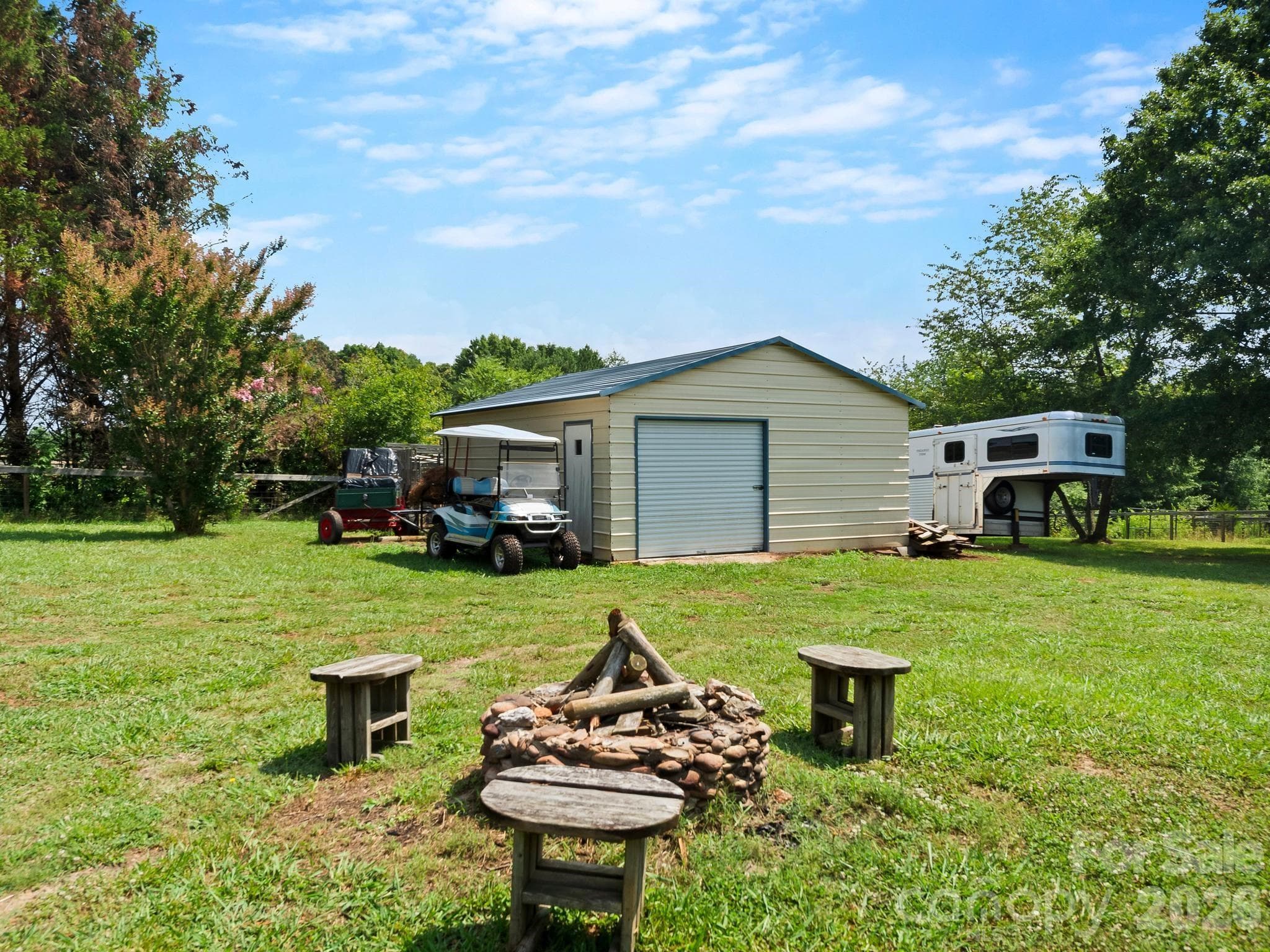 A 20 x 25 ft metal storage building for farm equipment and other storage. - 1541 Sandy Springs Road, Rutherfordton
