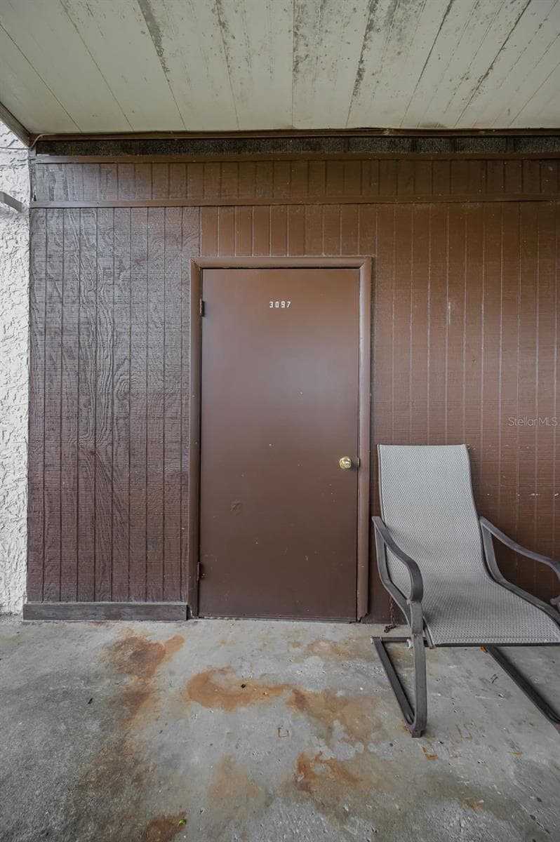 Storage closet at carport - 3097 MISSION GROVE DR, PALM HARBOR