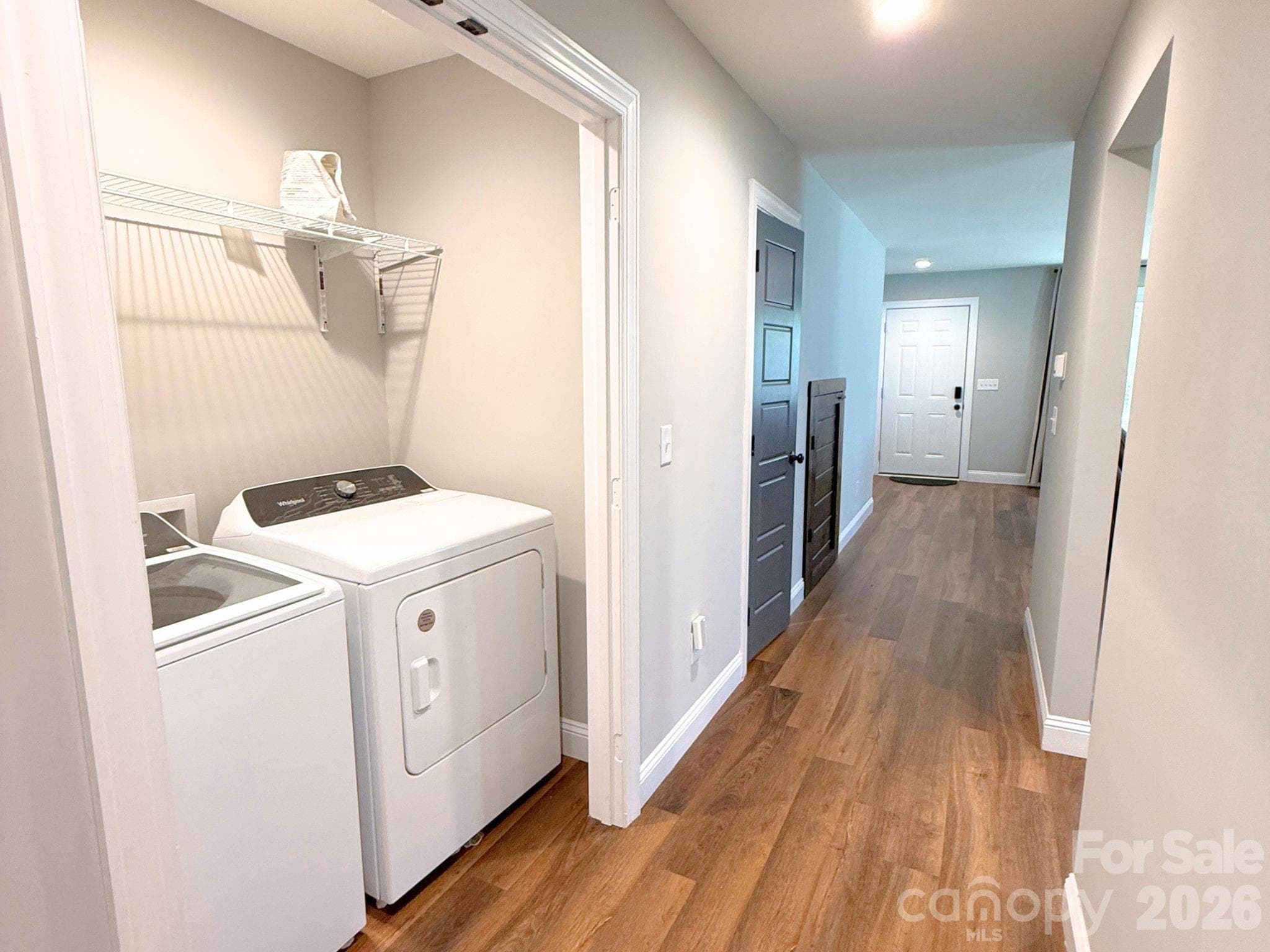 Laundry Area – Dedicated laundry space with washer and dryer included, conveniently located near the main living areas for everyday ease. - Chester