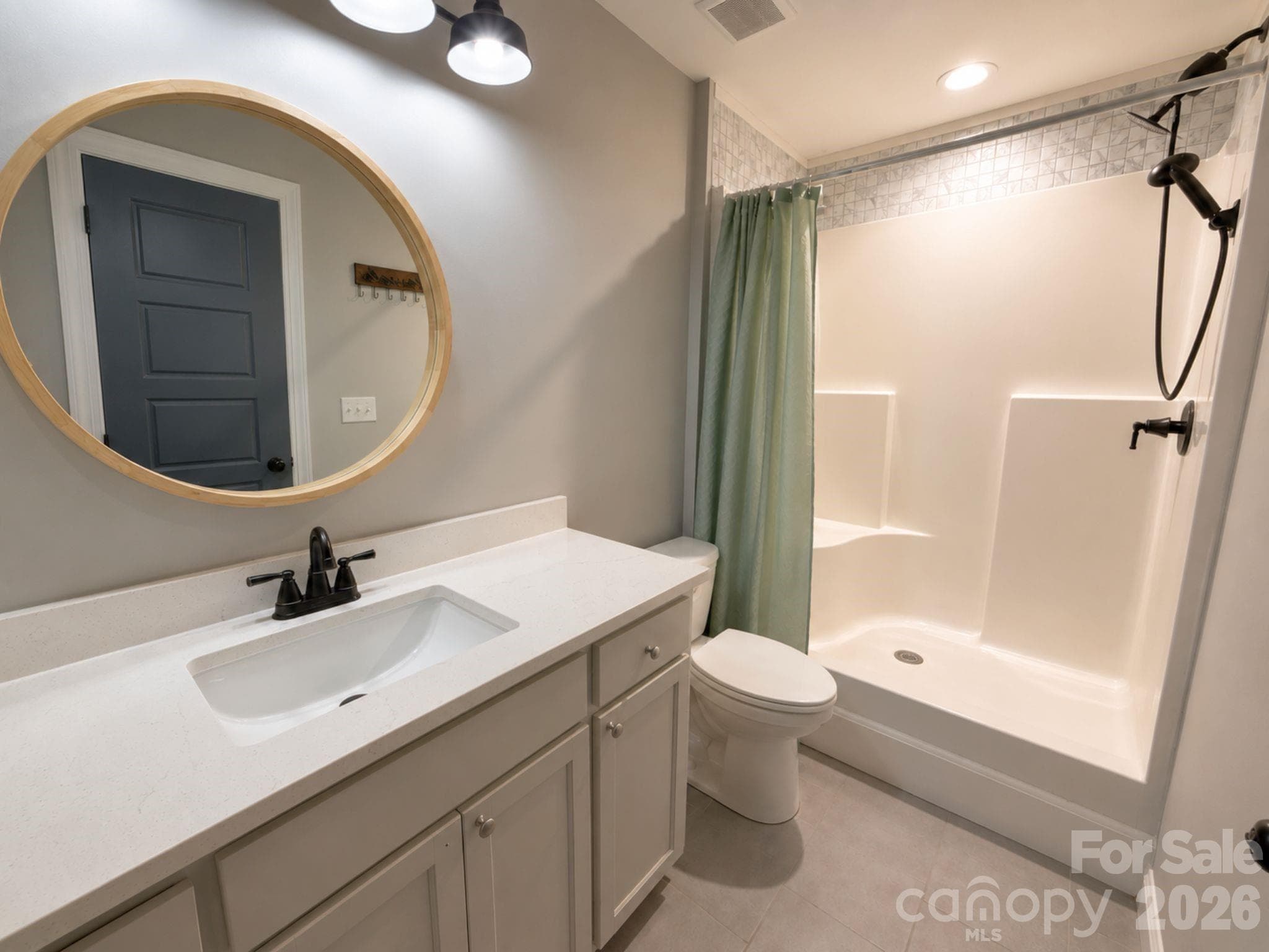 Primary Bathroom – Bright en-suite bathroom offering a walk-in shower, contemporary finishes, and a clean, functional layout. - Chester
