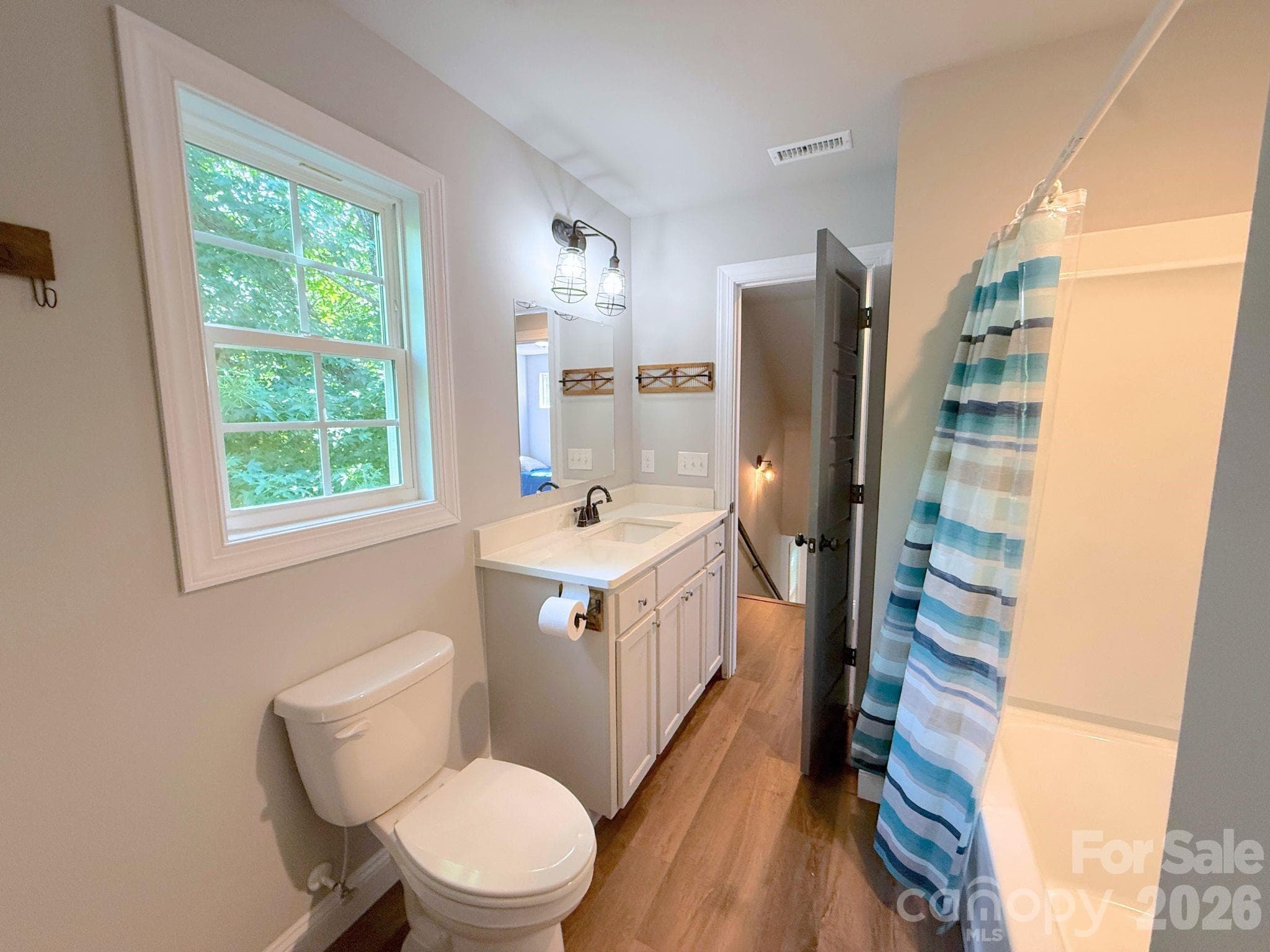 Full Bathroom – Upstairs full bath with a modern vanity, updated fixtures, and a tub/shower combination for added convenience. - Chester