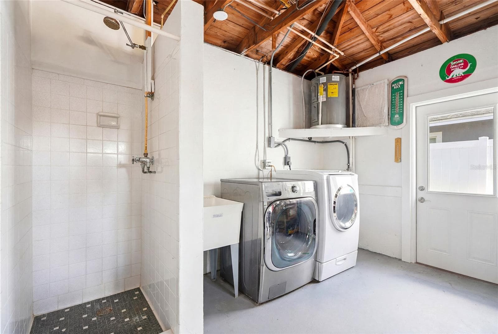 Shower/washer/dryer in garage - 4822 60TH WAY N, KENNETH CITY