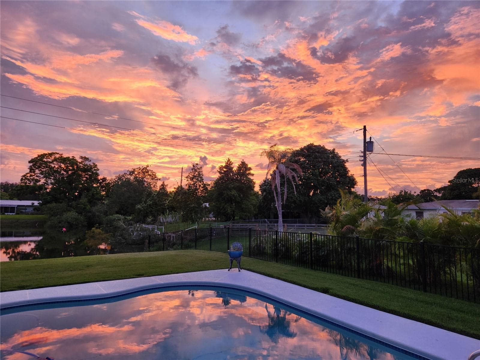 Sunsets from backyard - 4822 60TH WAY N, KENNETH CITY