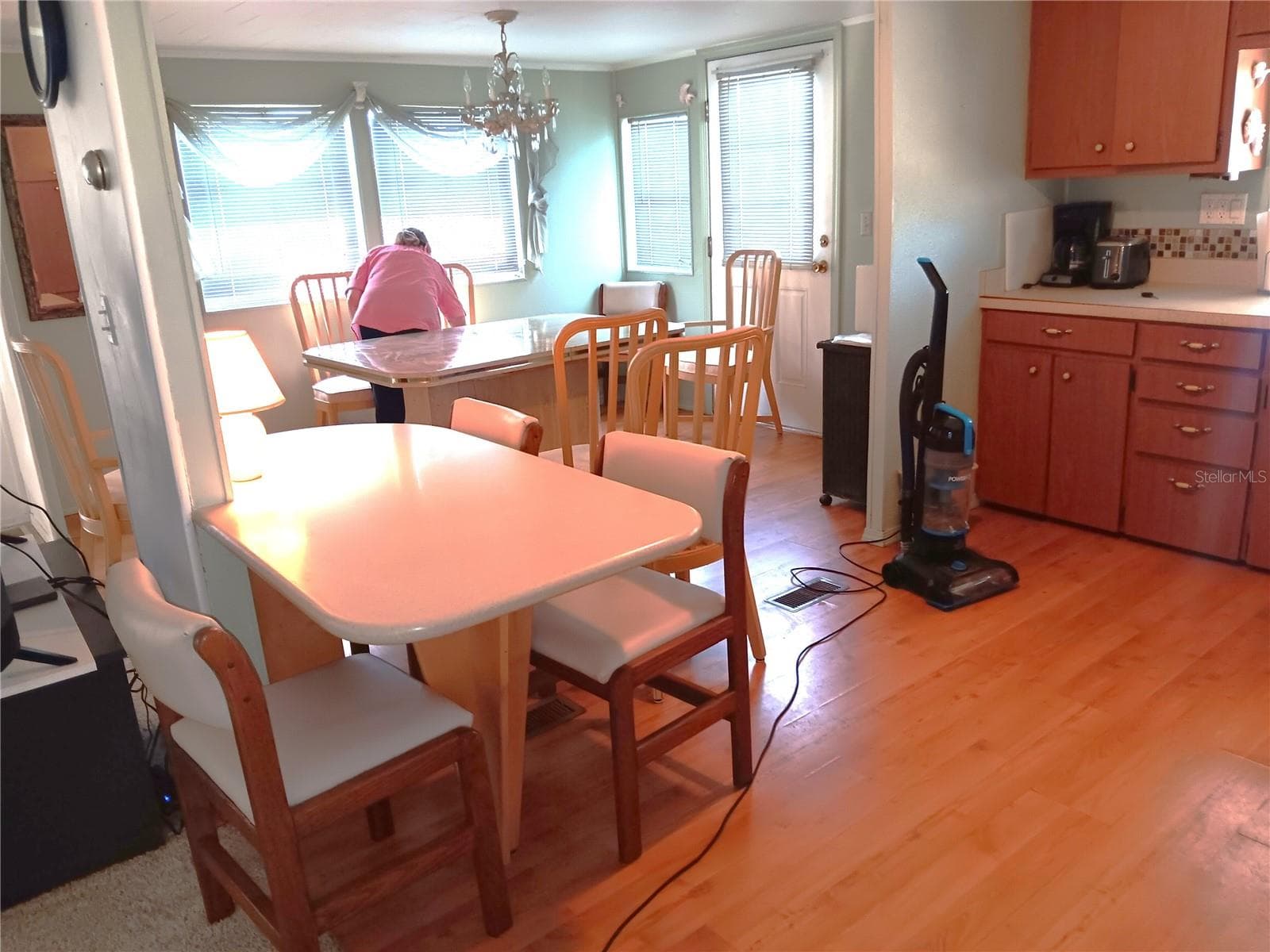 Kitchen area looking toward the dining room table. - 1781 OLYMPIA FIELDS ST, SARASOTA