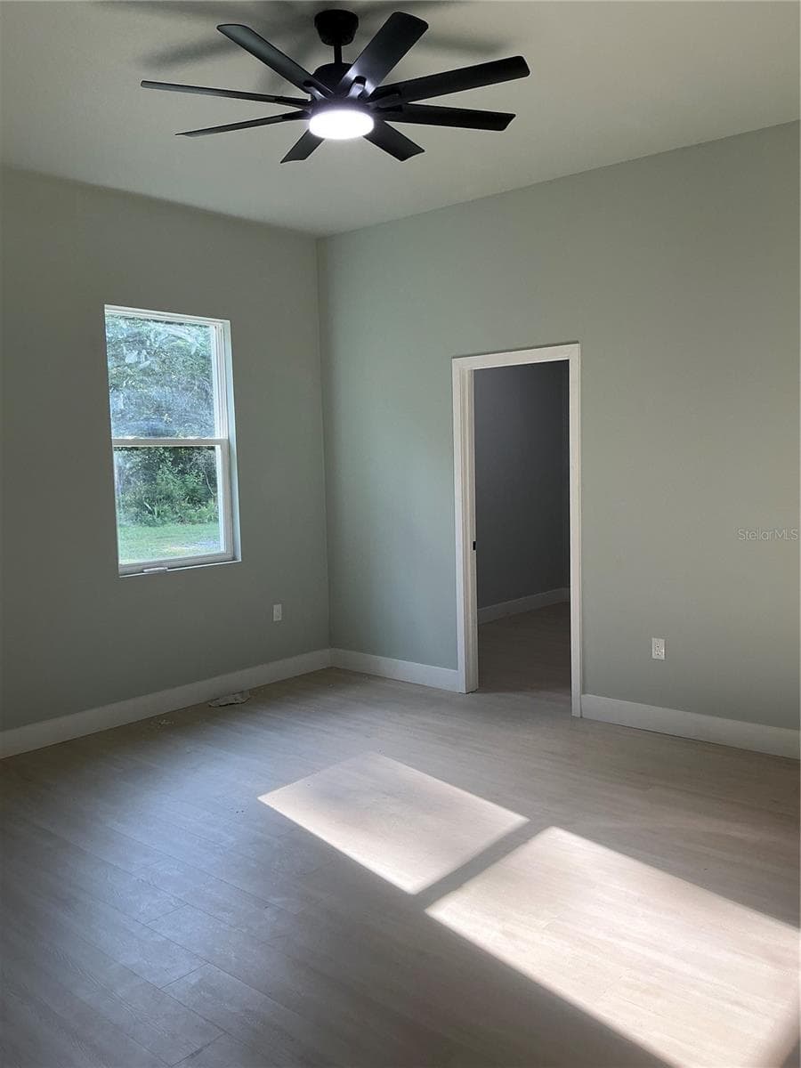 Rear Primary Bedroom - 1619 MAGNOLIA AVE, DELAND