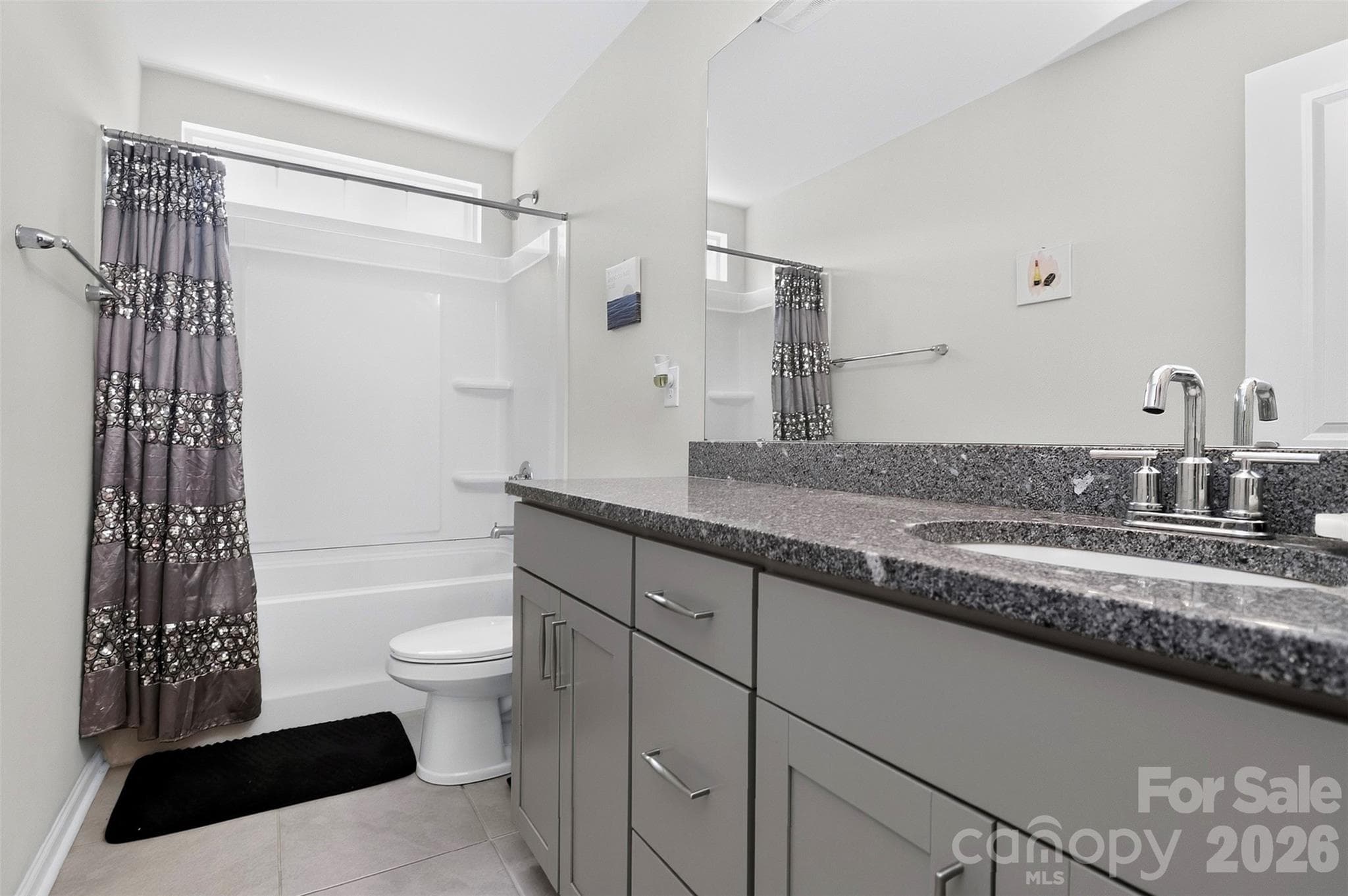 second full bath with window over shower/tub combo - 1019 Chicory Trace, Clover