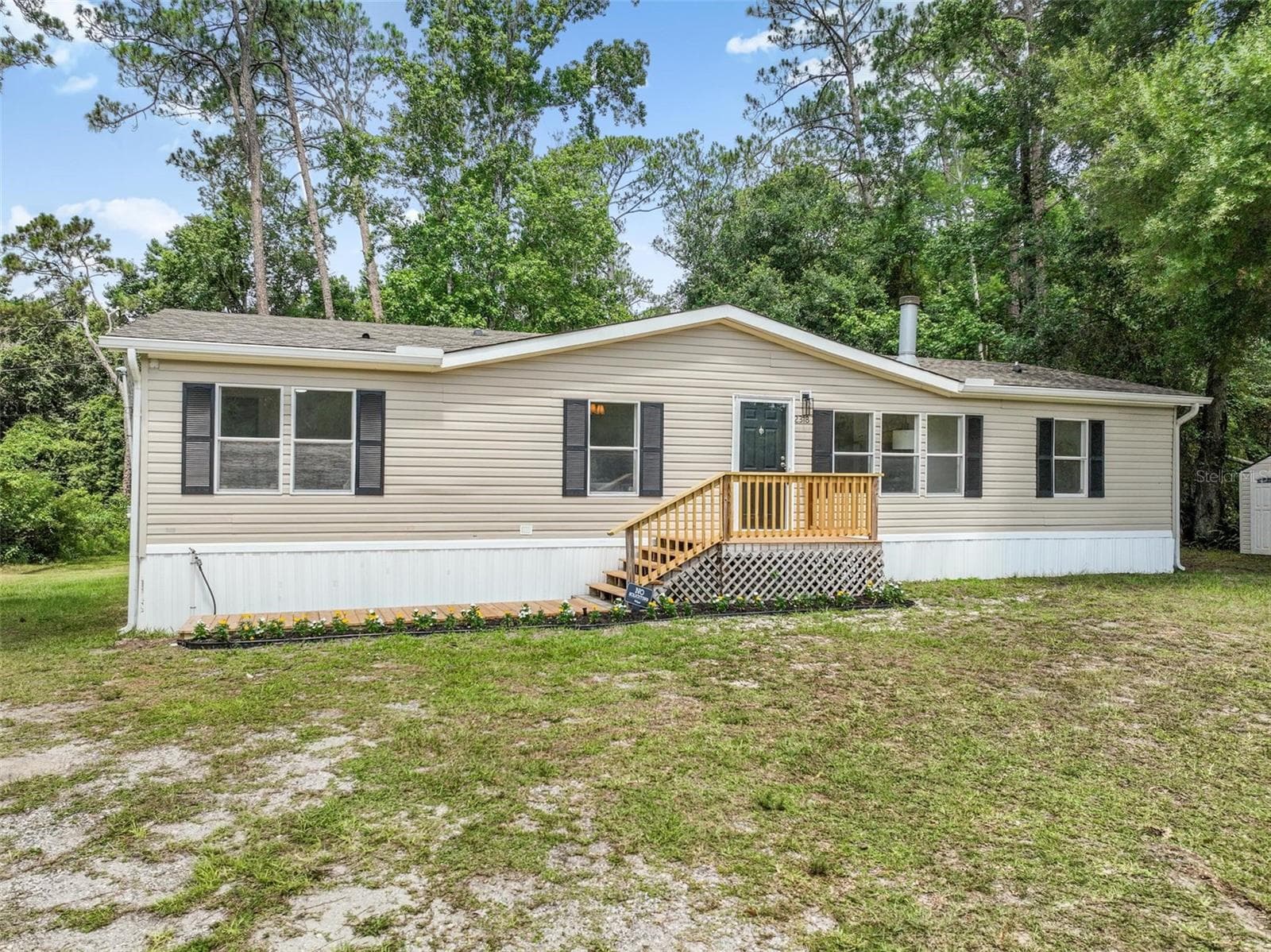 Manufactured Home at 2318 COCONUT BLVD, BUNNELL, photo 2 of 52
