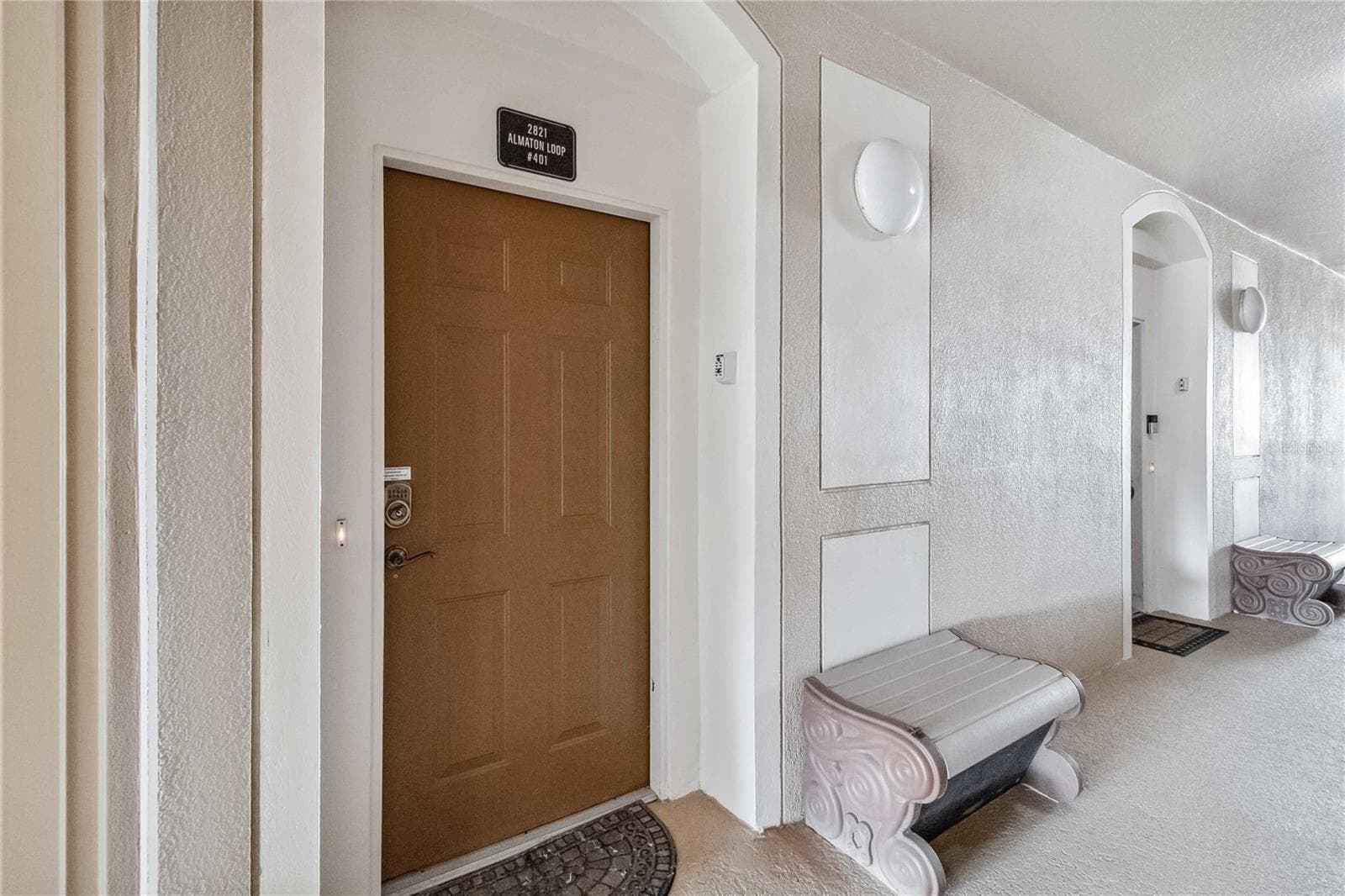 Main door with key pad. - 2821 E ALMATON LOOP #401, KISSIMMEE