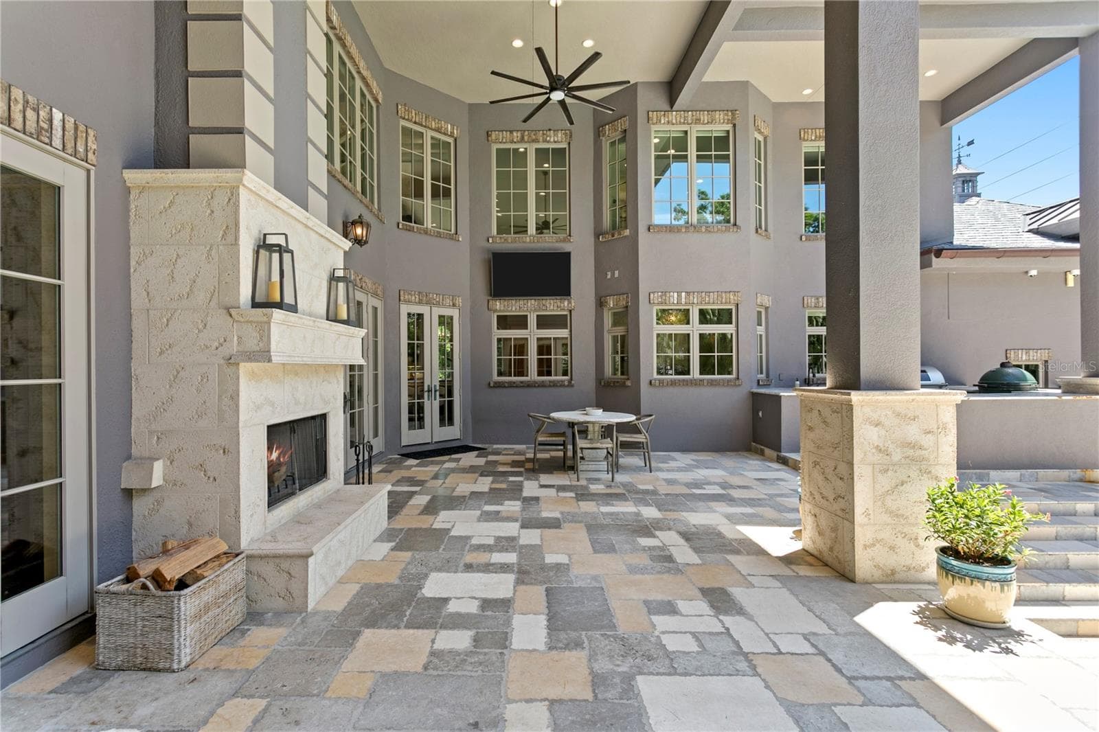 Large outdoor covered patio with wood burning fireplace - 401 SNELL ISLE BLVD NE, ST PETERSBURG