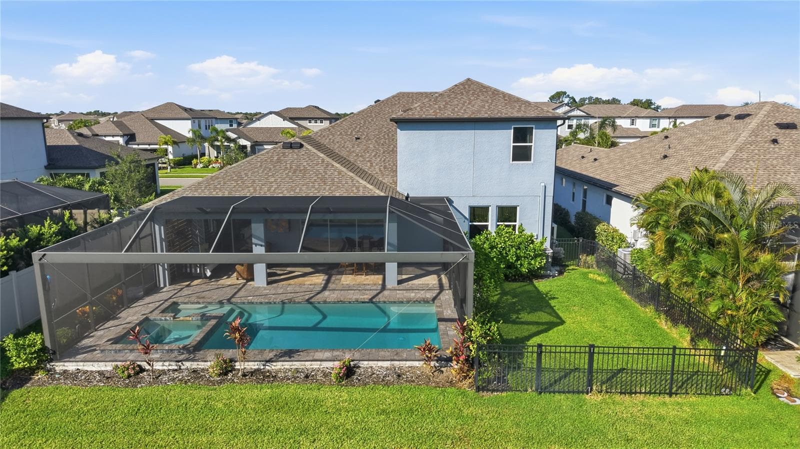 Photo From the Rear of the Property - 5542 NATIVE HENNA CT, SARASOTA