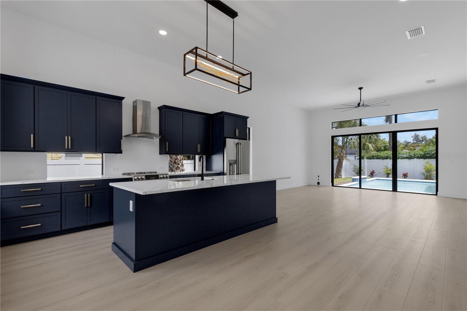 Dining/Kitchen overlooking living room - 2069 HIBISCUS ST, SARASOTA