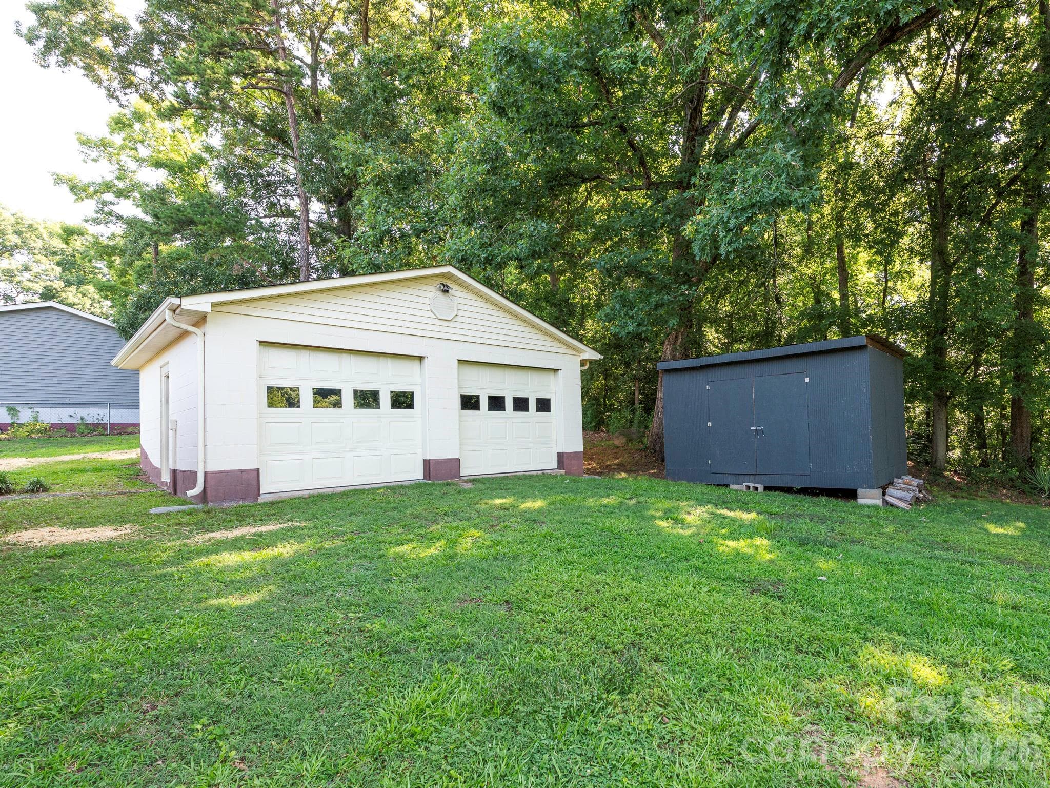 2 car garage/shop 24x24 and outbuilding 15'10"x10'5" - Concord