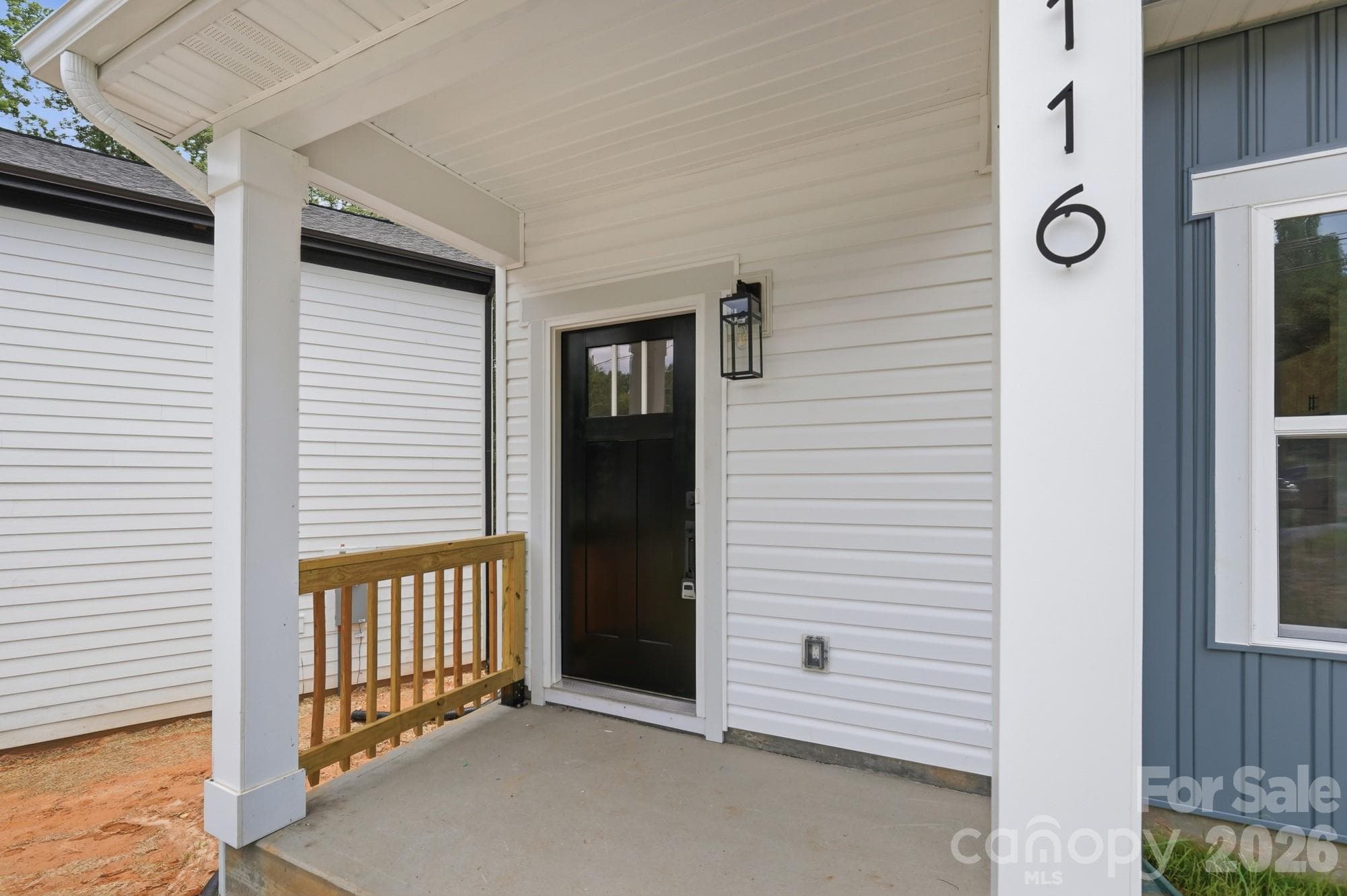 View of Front Door & Covered Front Porch - Hickory